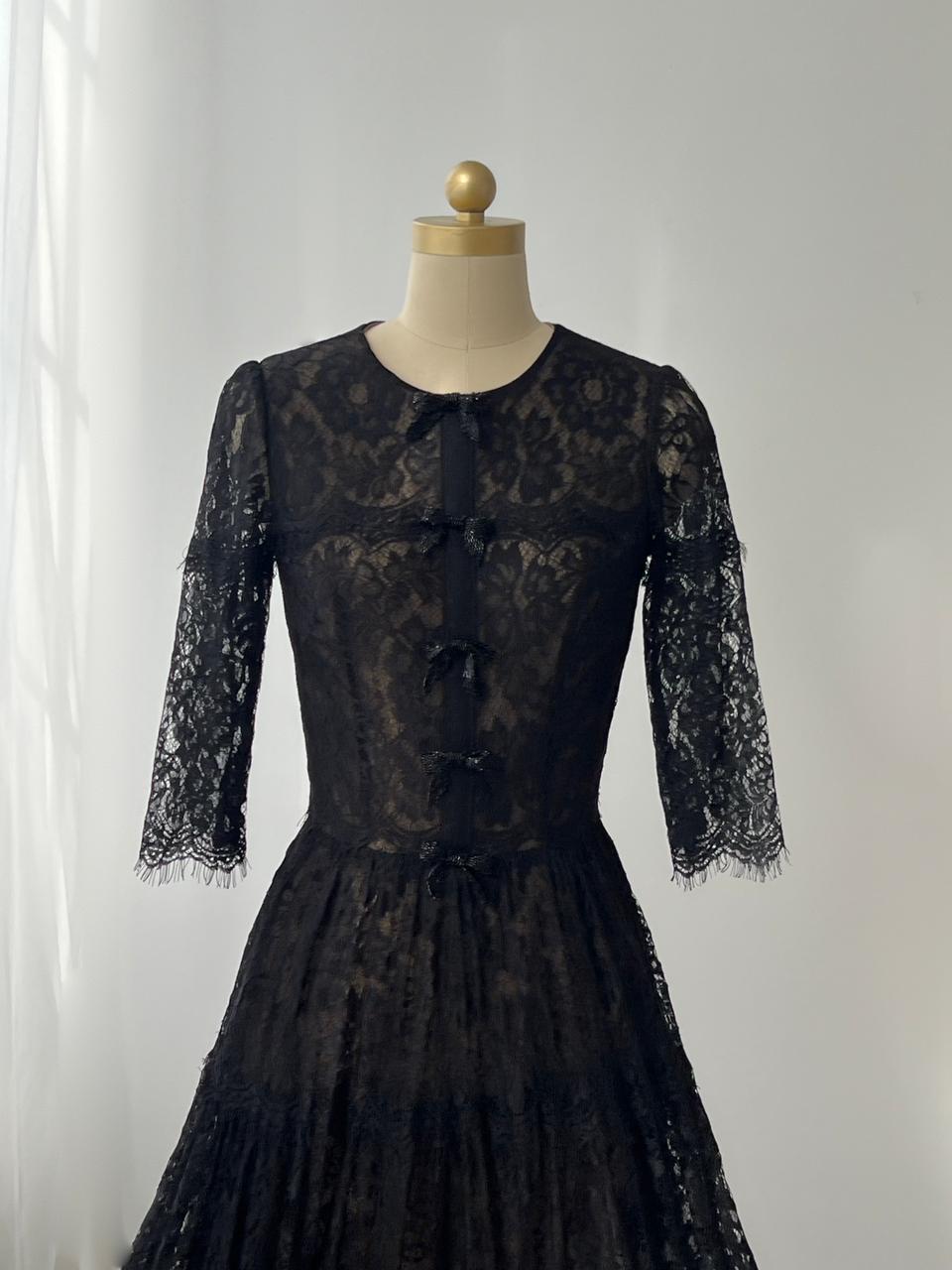 Black A-Line gown with lace, embroidered bow and short sleeves