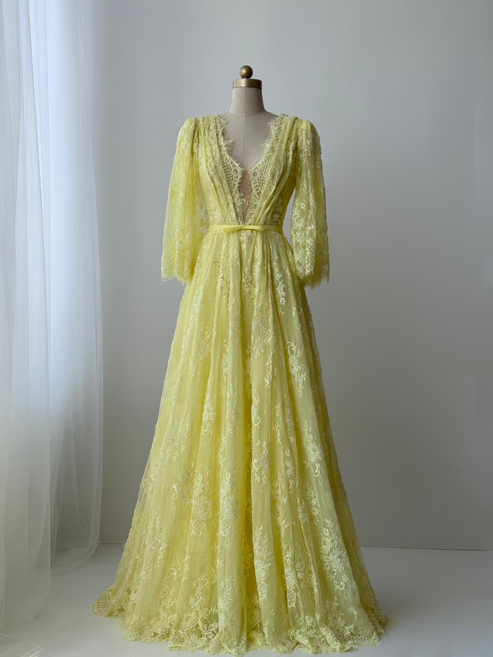 Yellow A-Line gown with v-neck, long sleeves and lace
