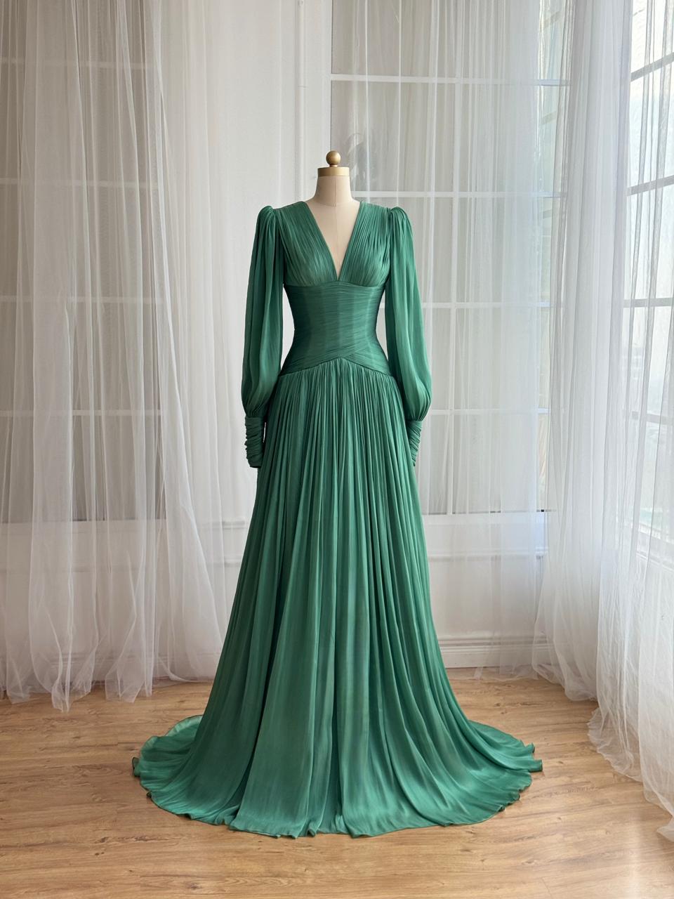 Green A-Line gown with long sleeves and. v-neck