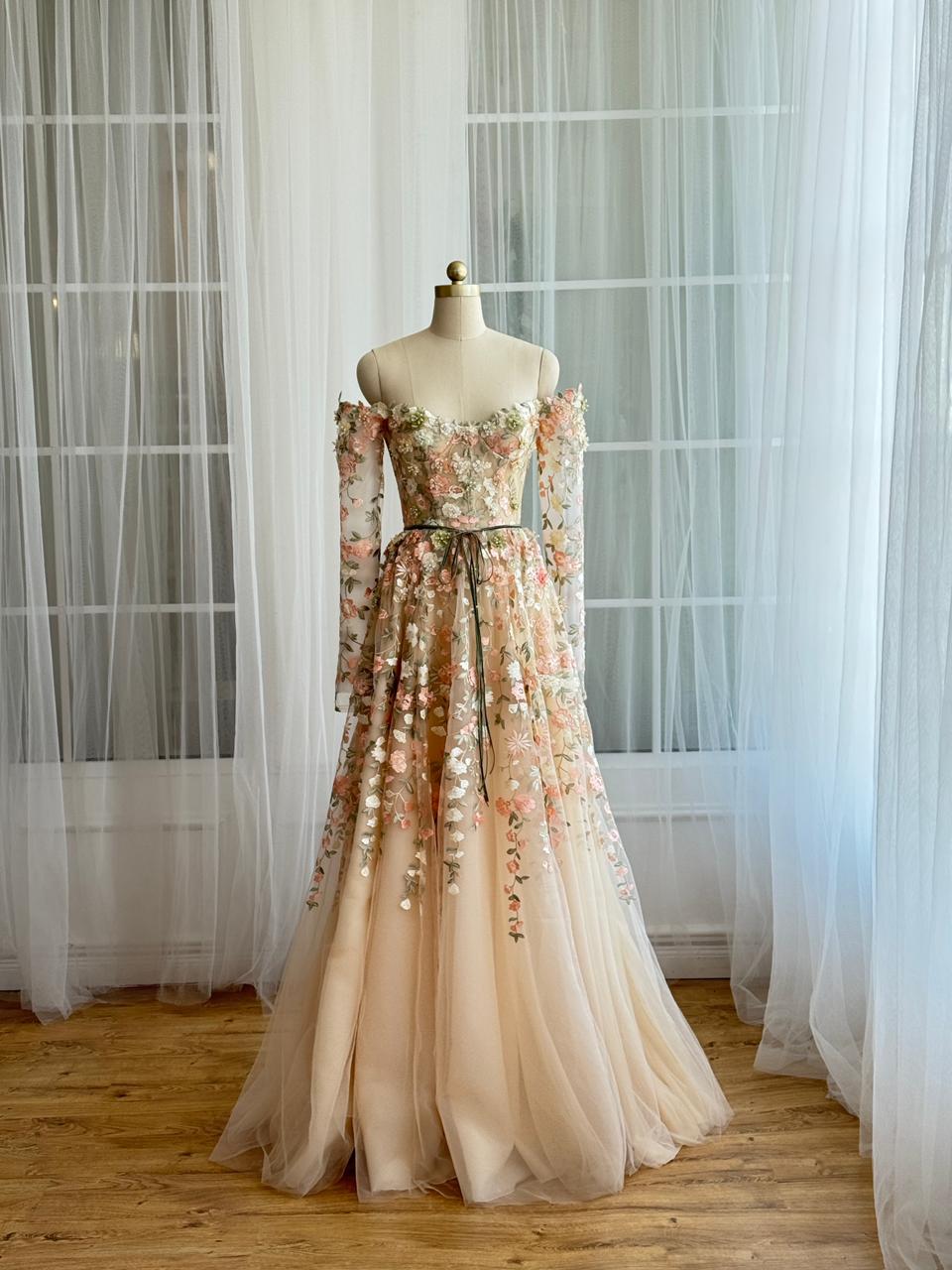 Beige A-Line dress with long off the shoulder sleeves and embroidery