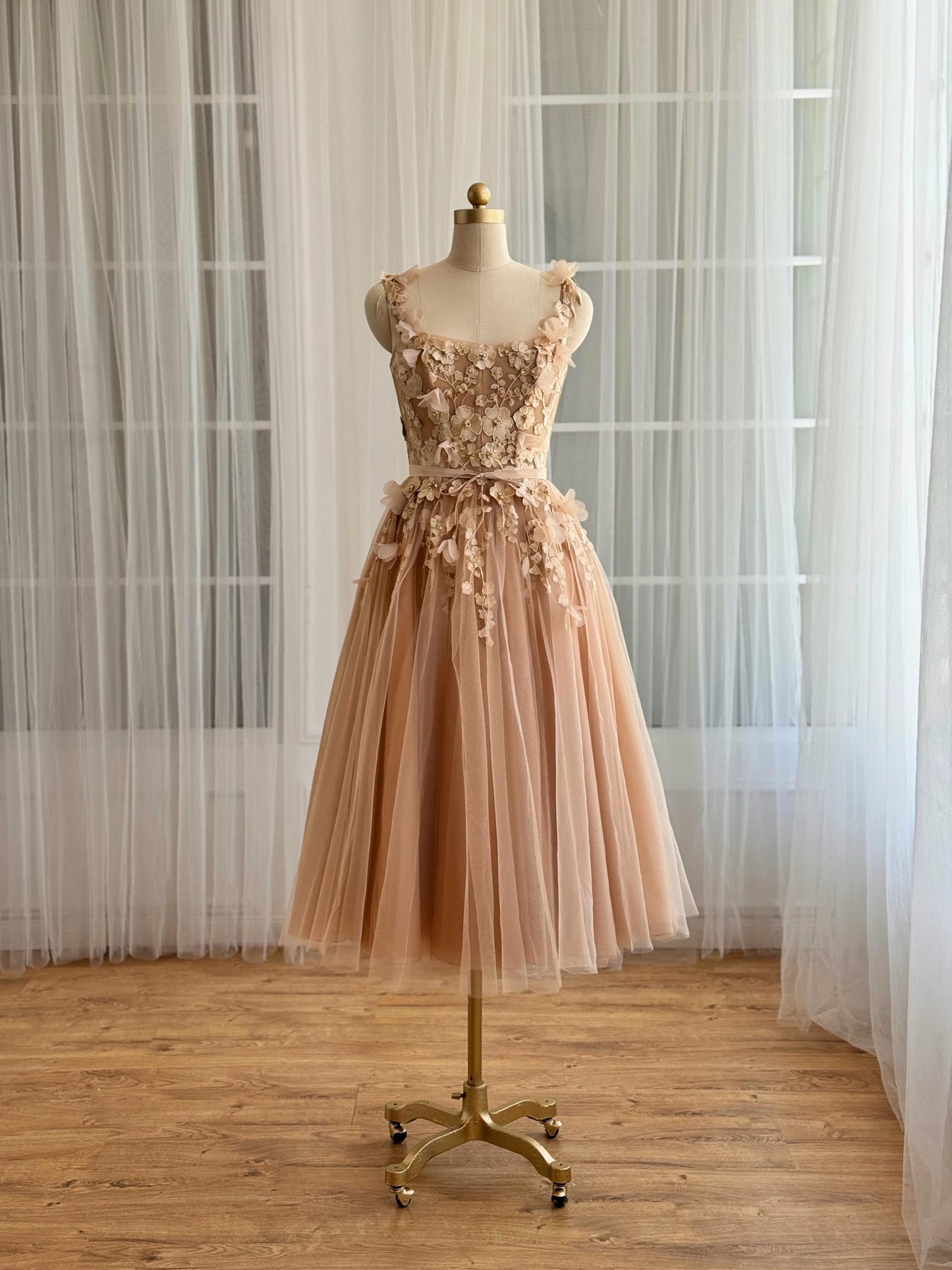 Beige midi dress with embroidered flowers and straps