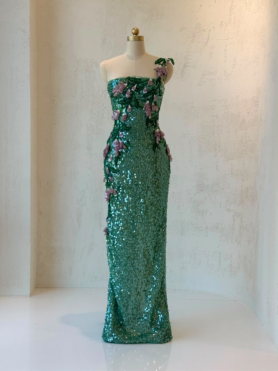 Green mermaid gown with one shoulder strap, sequins and embroidery