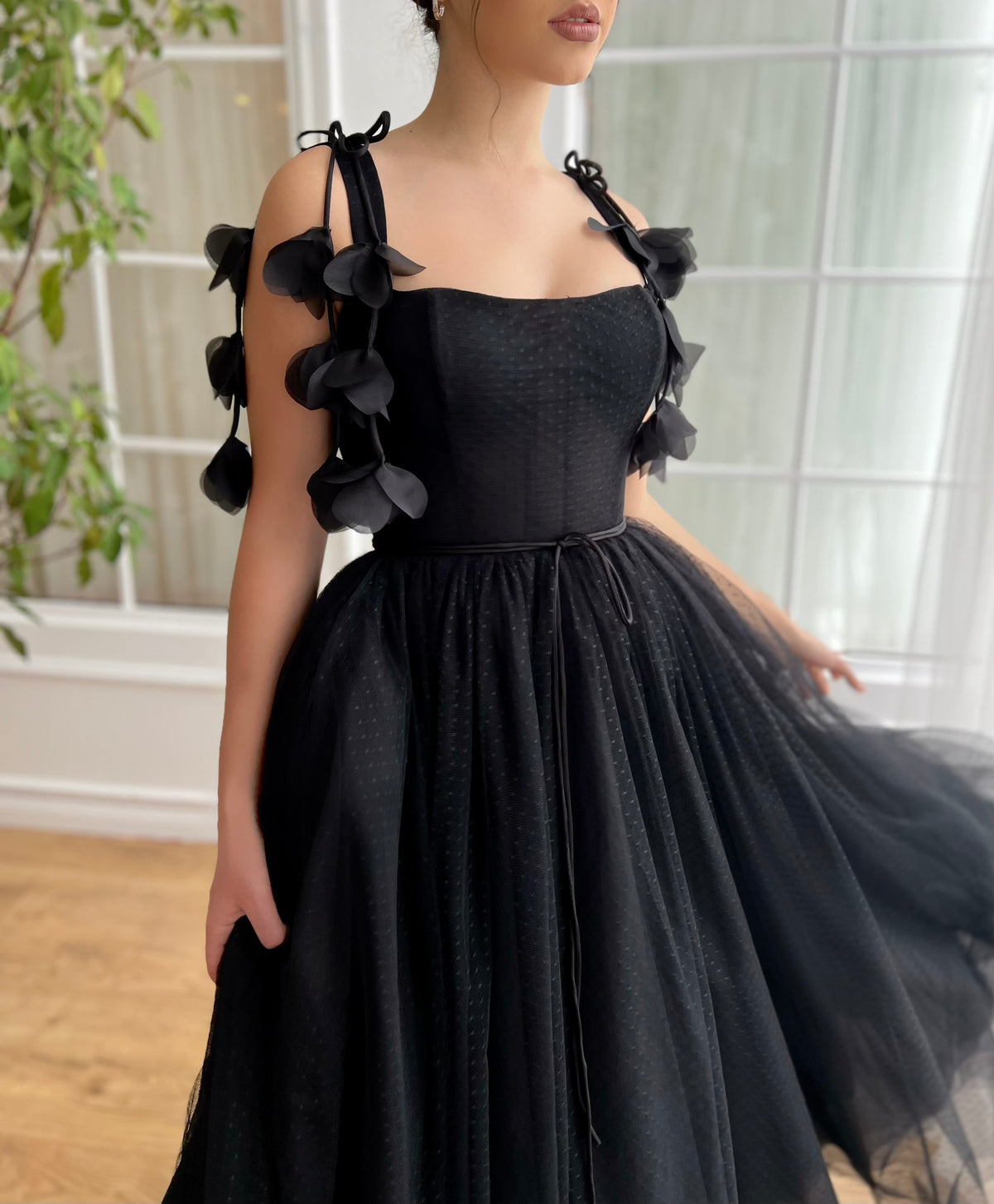 Black midi dress with embroidered flowers and straps