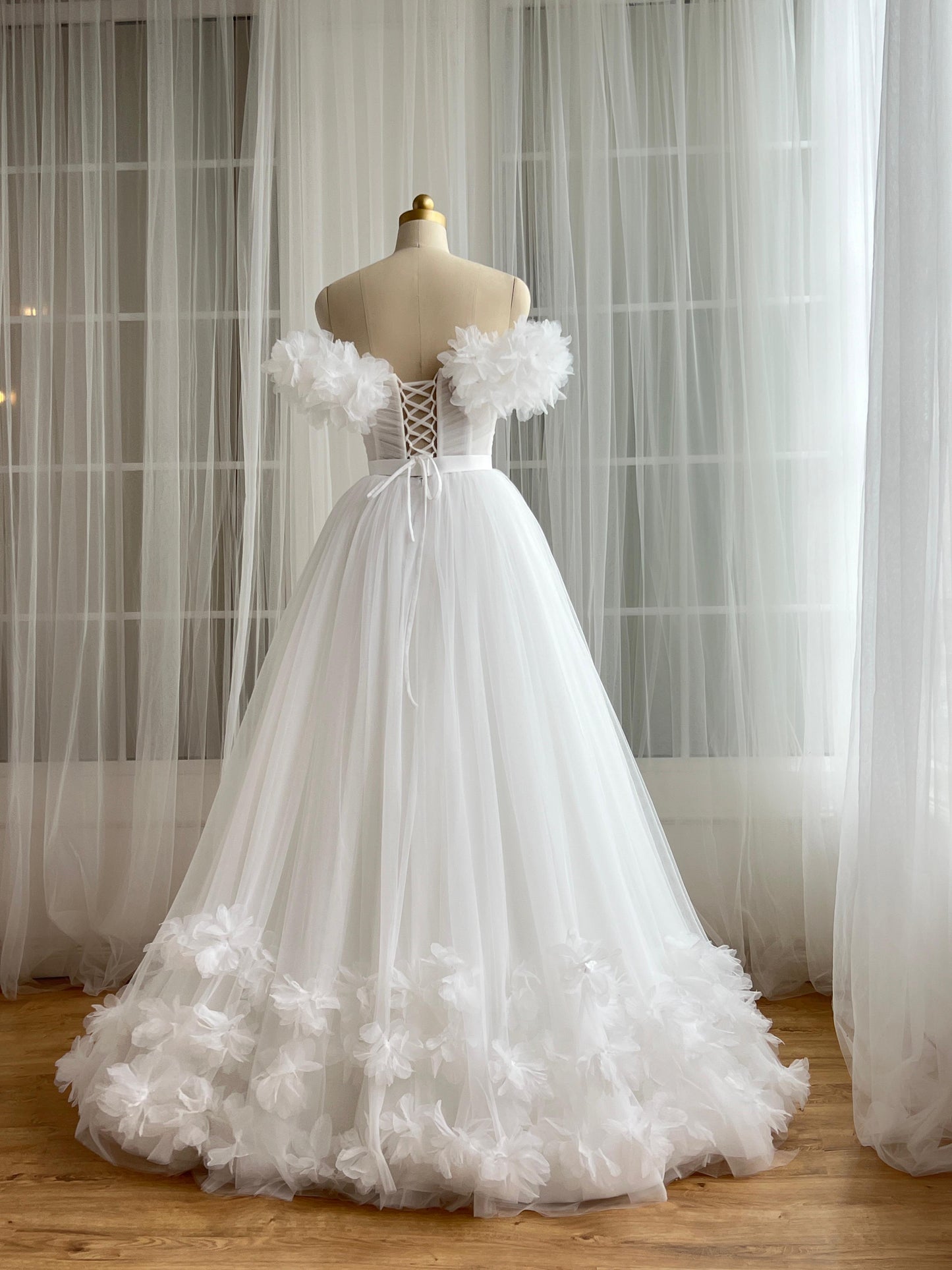 White bridql A-Line gown with embroidery, tulle and off the shoulder sleeves
