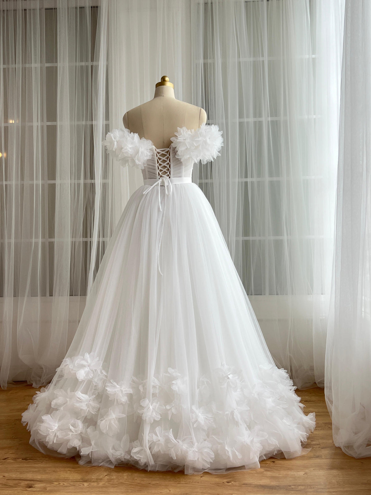 White bridql A-Line gown with embroidery, tulle and off the shoulder sleeves