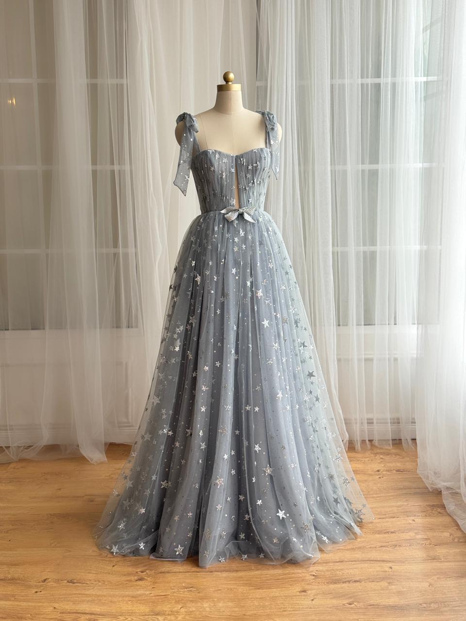 Silver A-Line gown with bow straps, embroidered bow and starry fabric