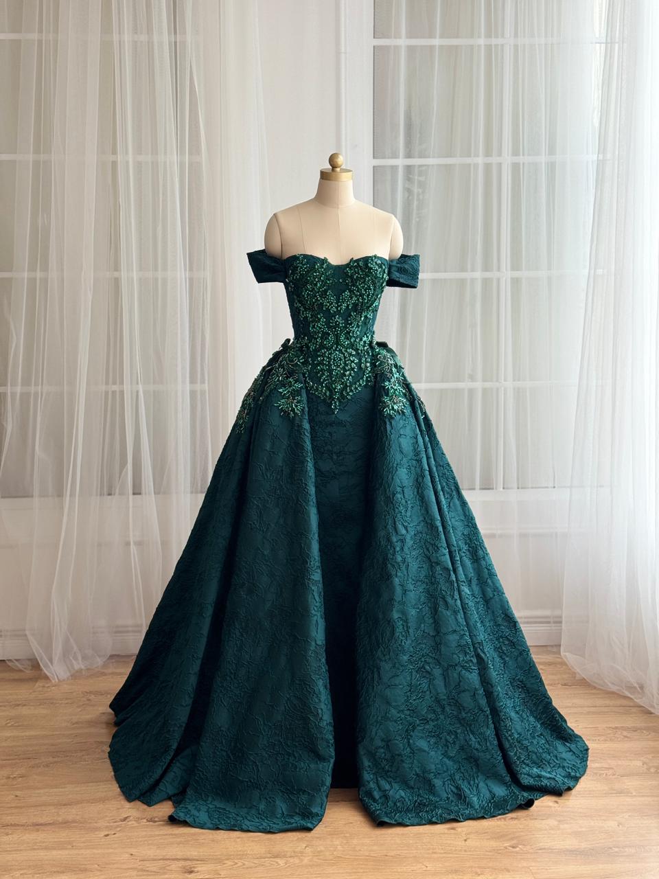 Green A-Line dress with overskirt, embroidery, brocade fabric and off the shoulder sleeves