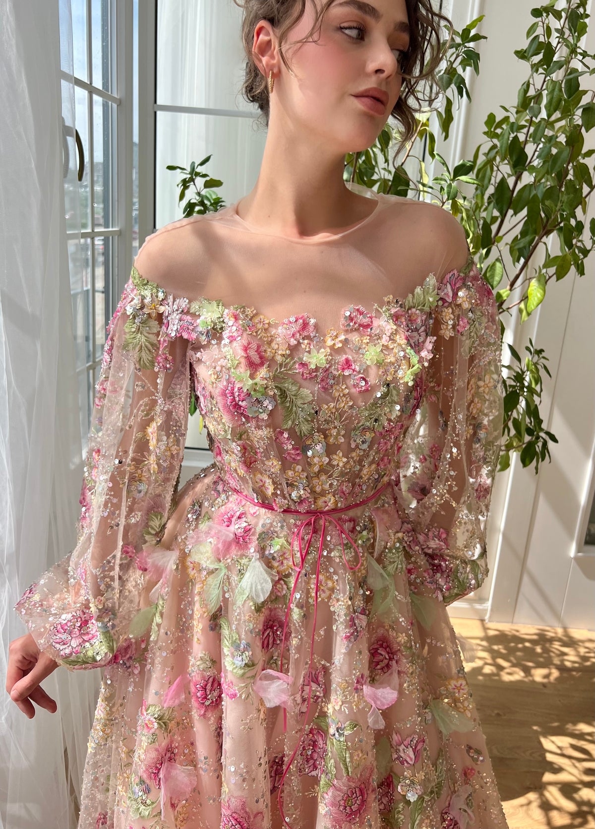 Pink A-Line dress with long off the shoulder sleeves and embroidery