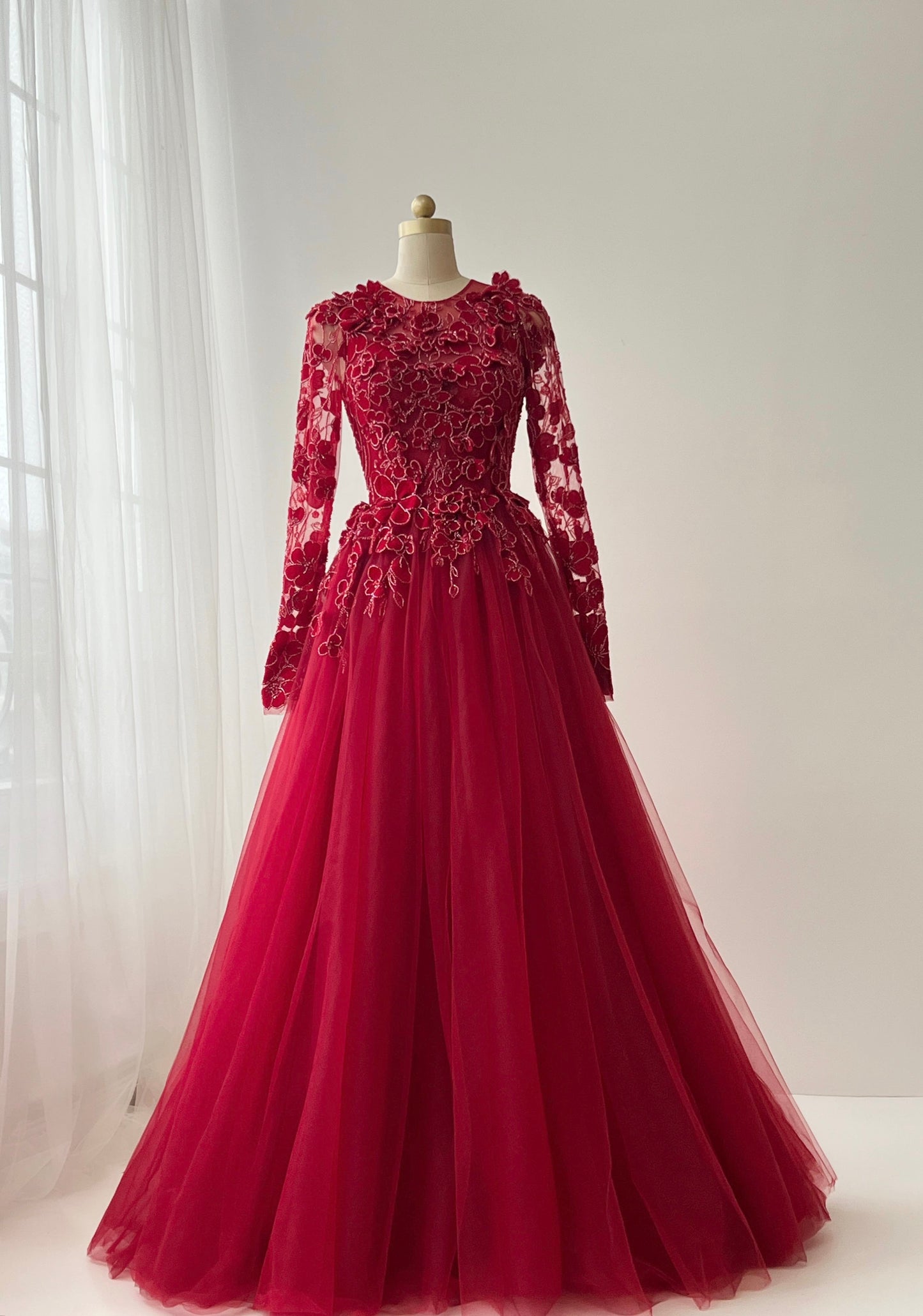 Red A-Line gown with long sleeves, lace and embroidery