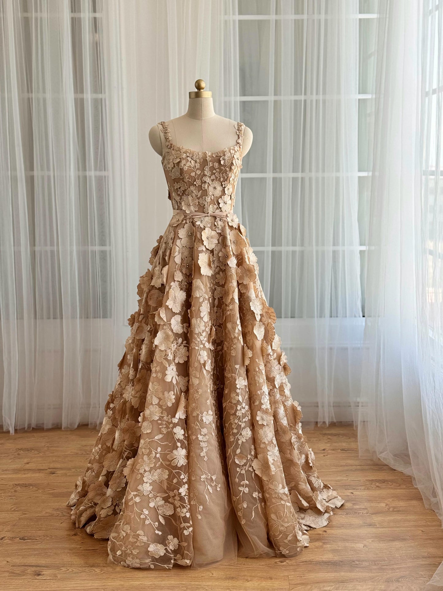 Beige A-Line dress with straps and embroidered flowers