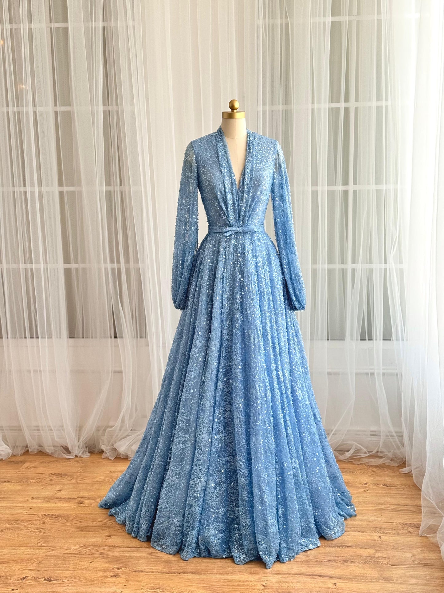 Blue A-Line dress with long sleeves, v-neck and sequin fabric