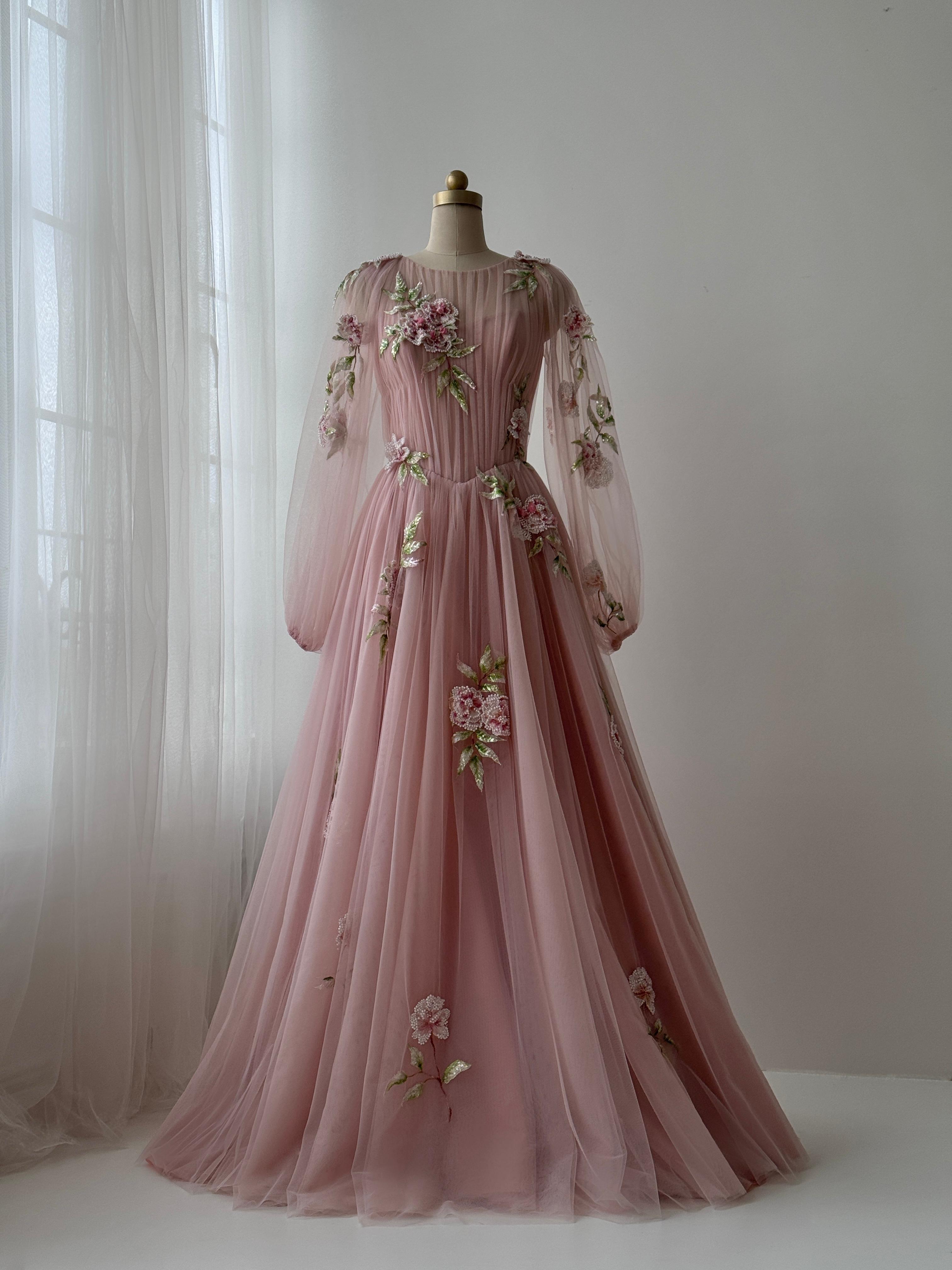 Pink A-Line gown with long sleeves, tulle fabric and embroidered flowers