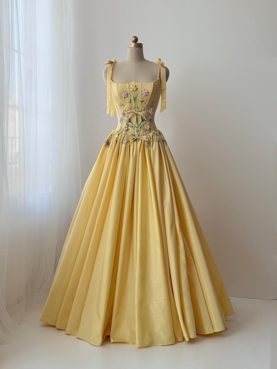 Yellow A-Line gown with embroidered bows, flowers and bow straps