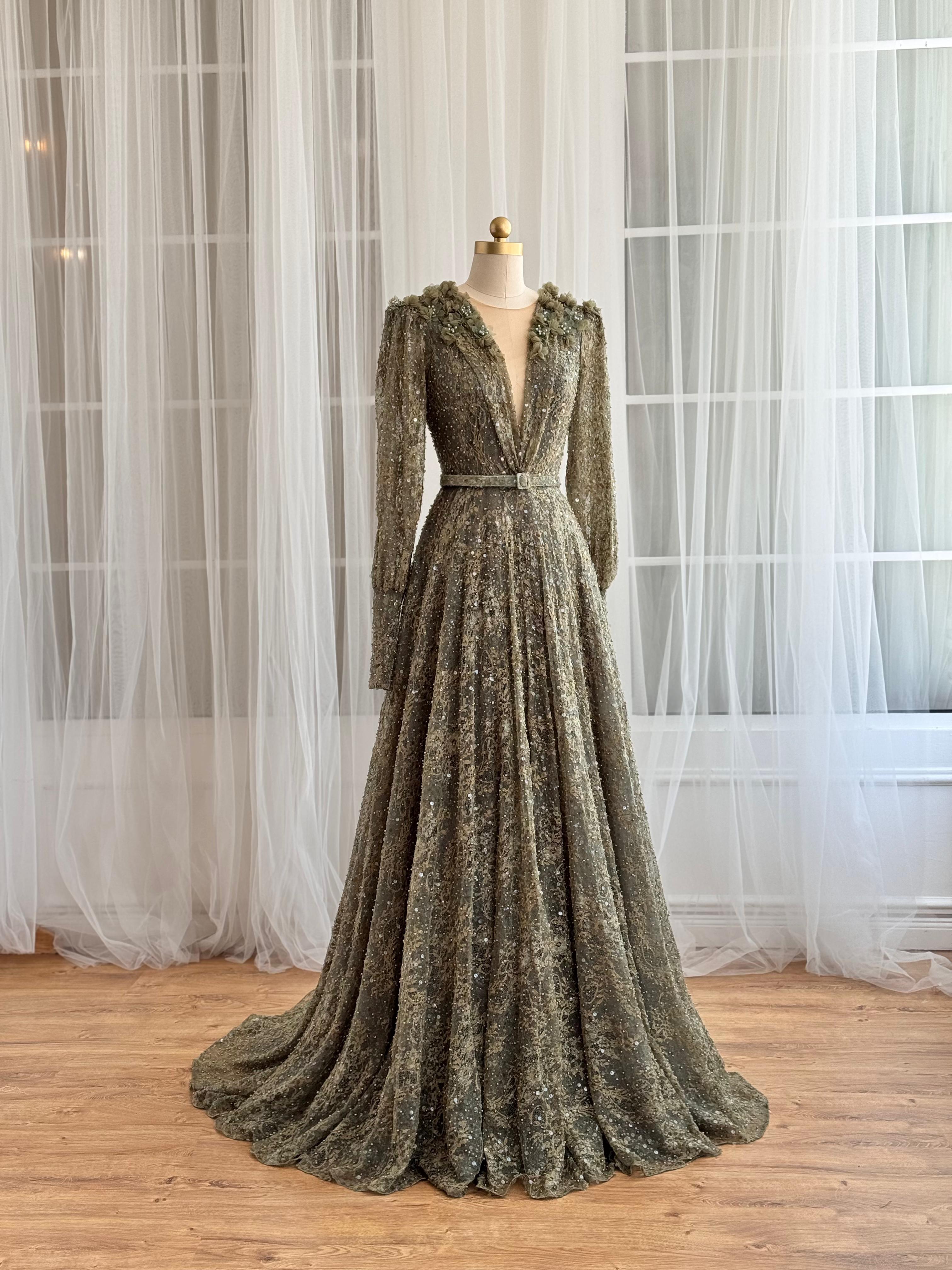 Green A-Line dress with v-neck, belt, long sleeves and embroidery