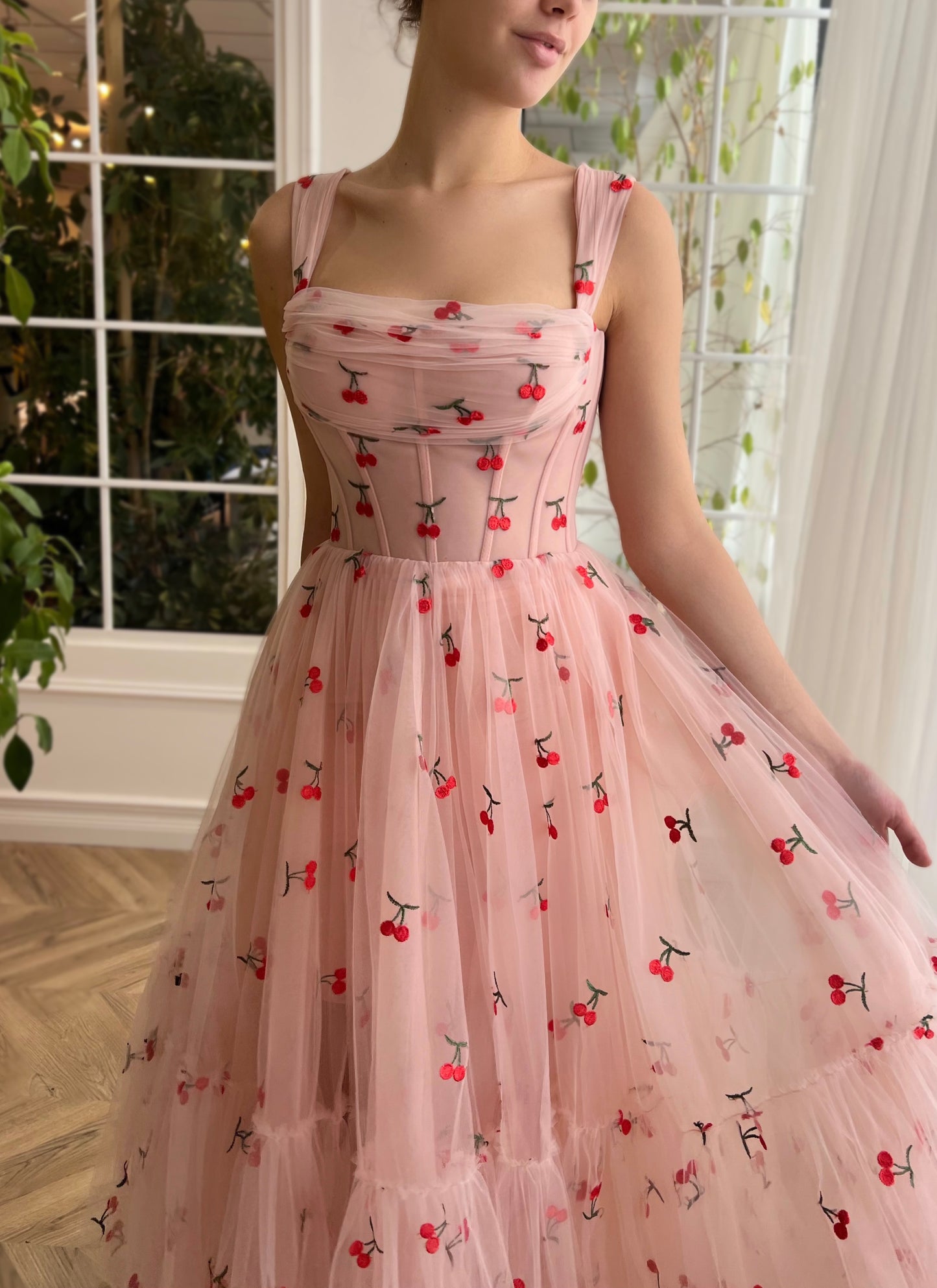 Pink midi dress with printed cherries and straps