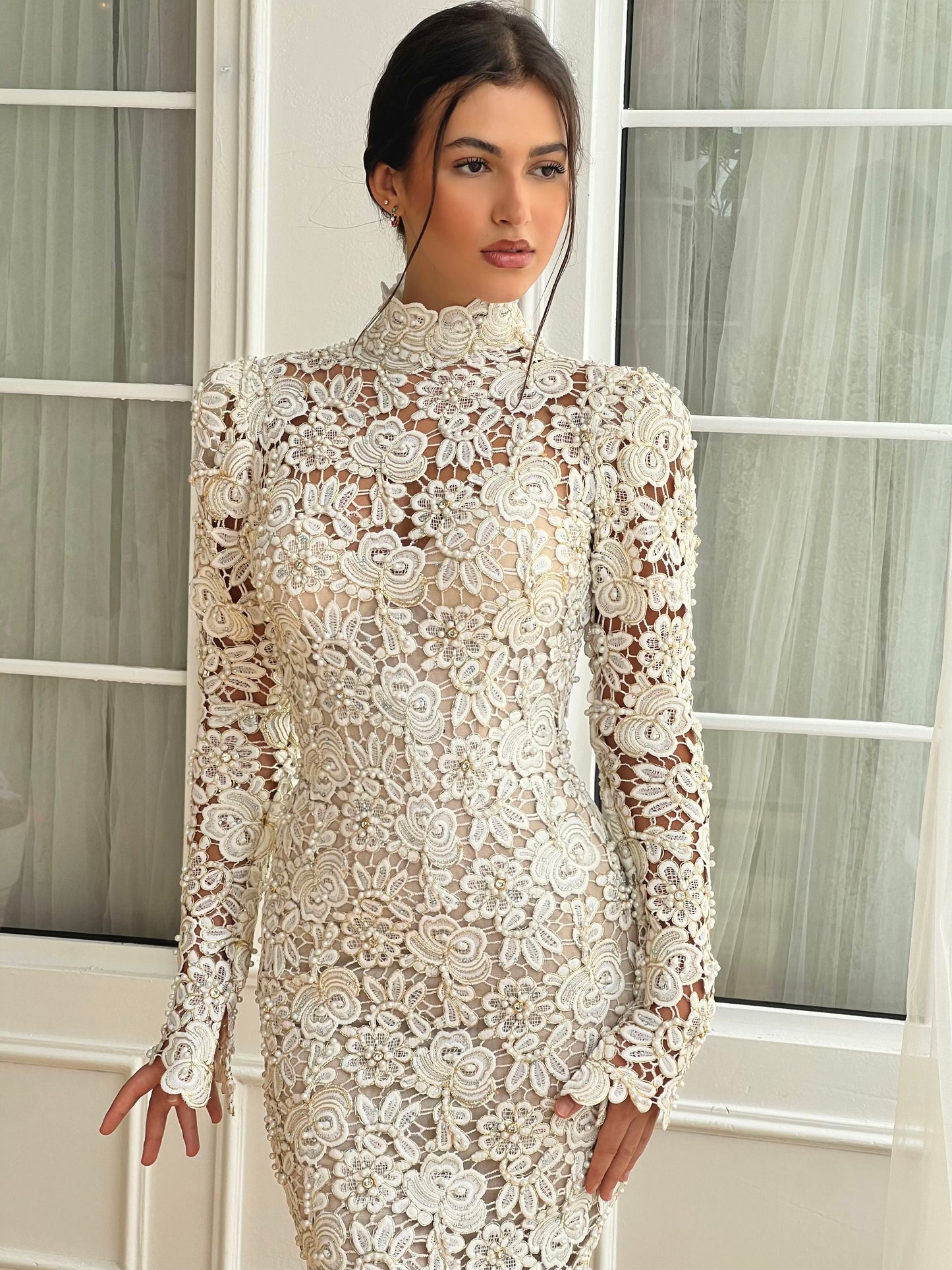 White bridal mermaid dress with long sleeves and lace