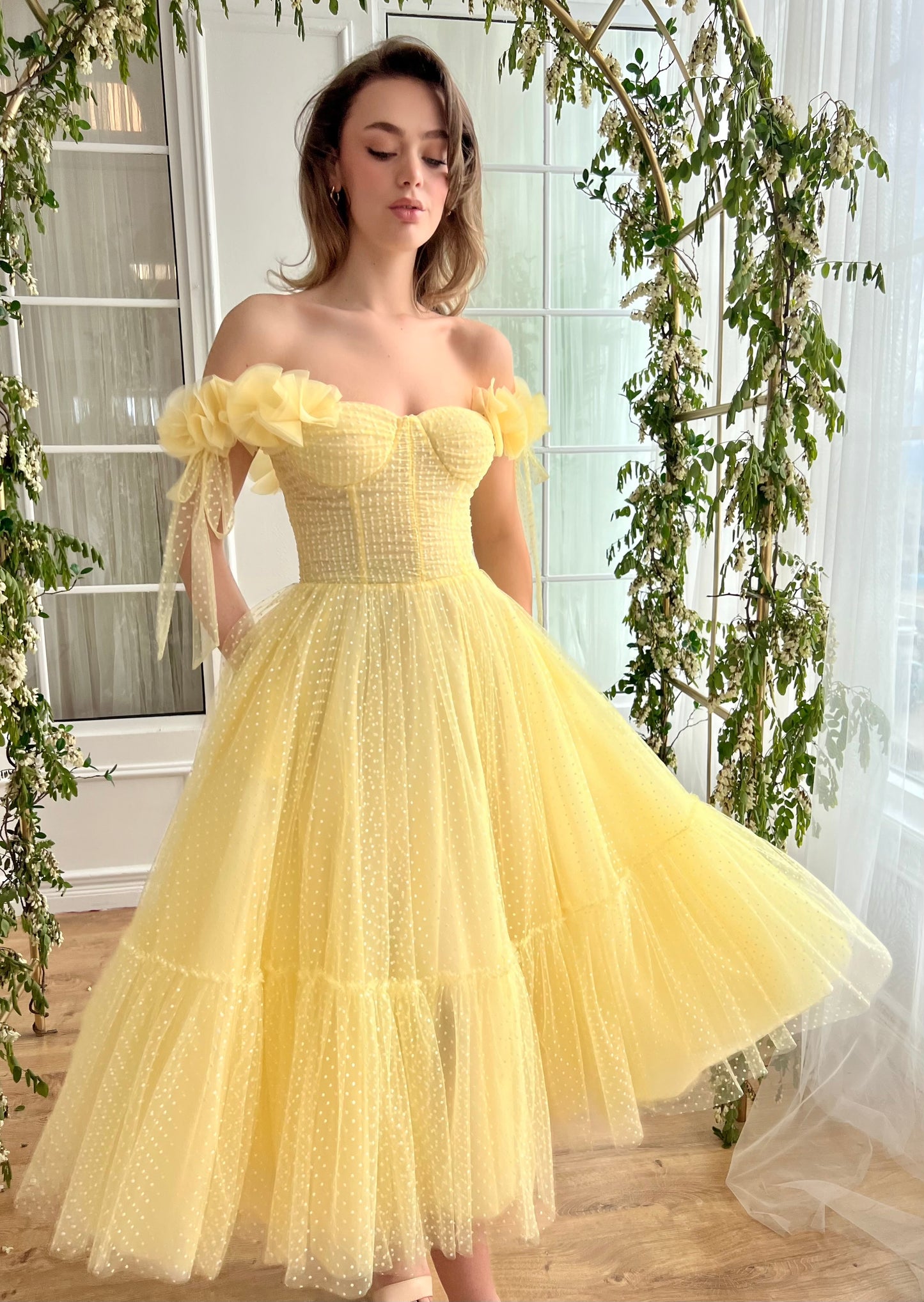 Yellow midi dress with off the shoulder sleeves and embroidery