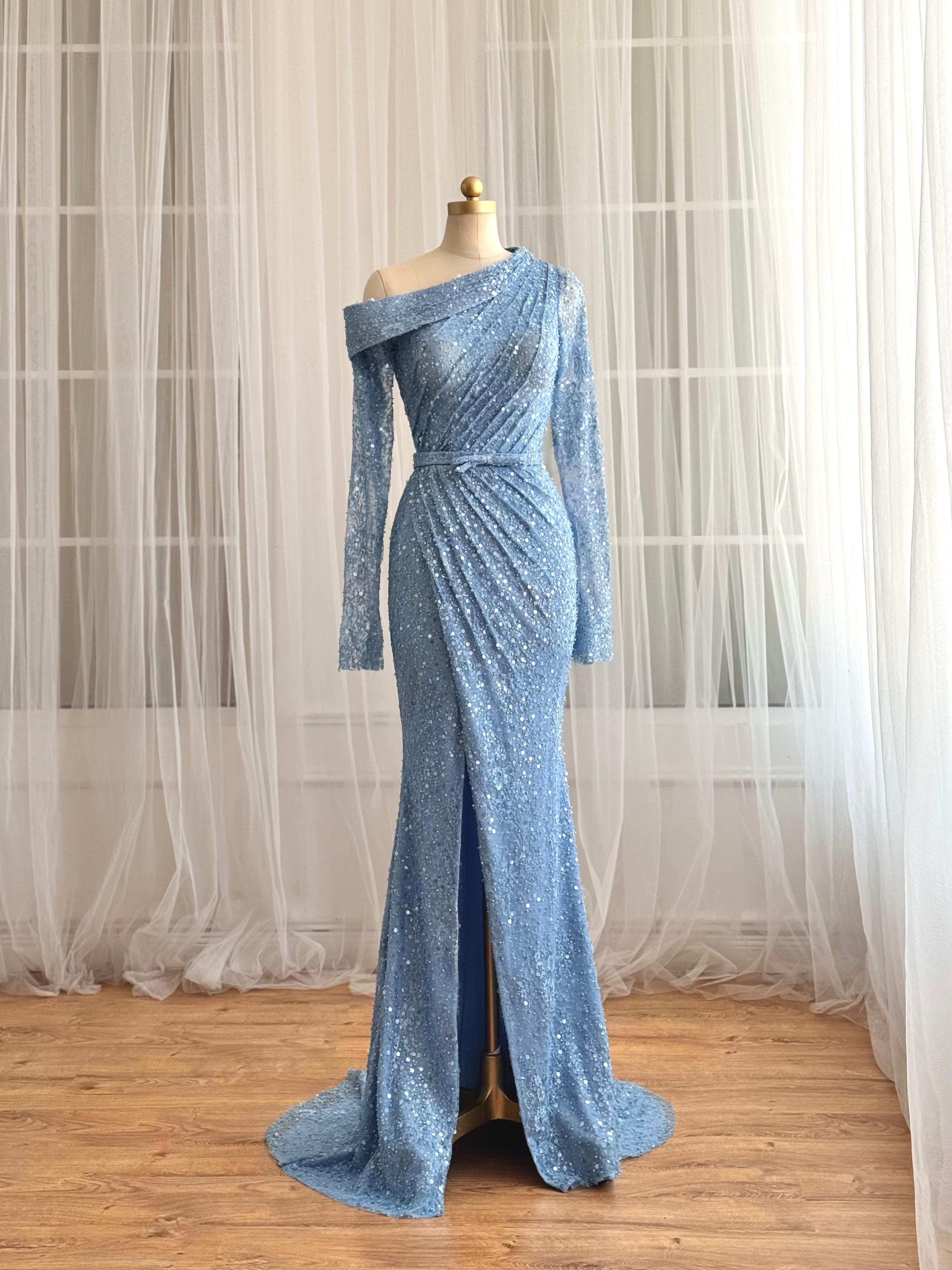 Blue mermaid dress with long sleeves and sequin fabric