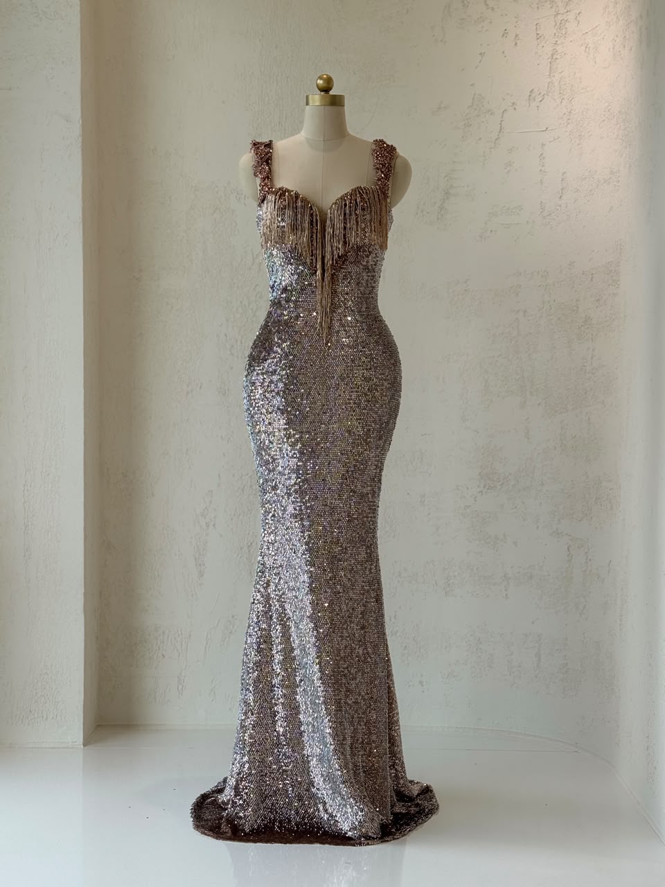 Rose gold mermaid gown with fringes, sequins, straps and embroidery