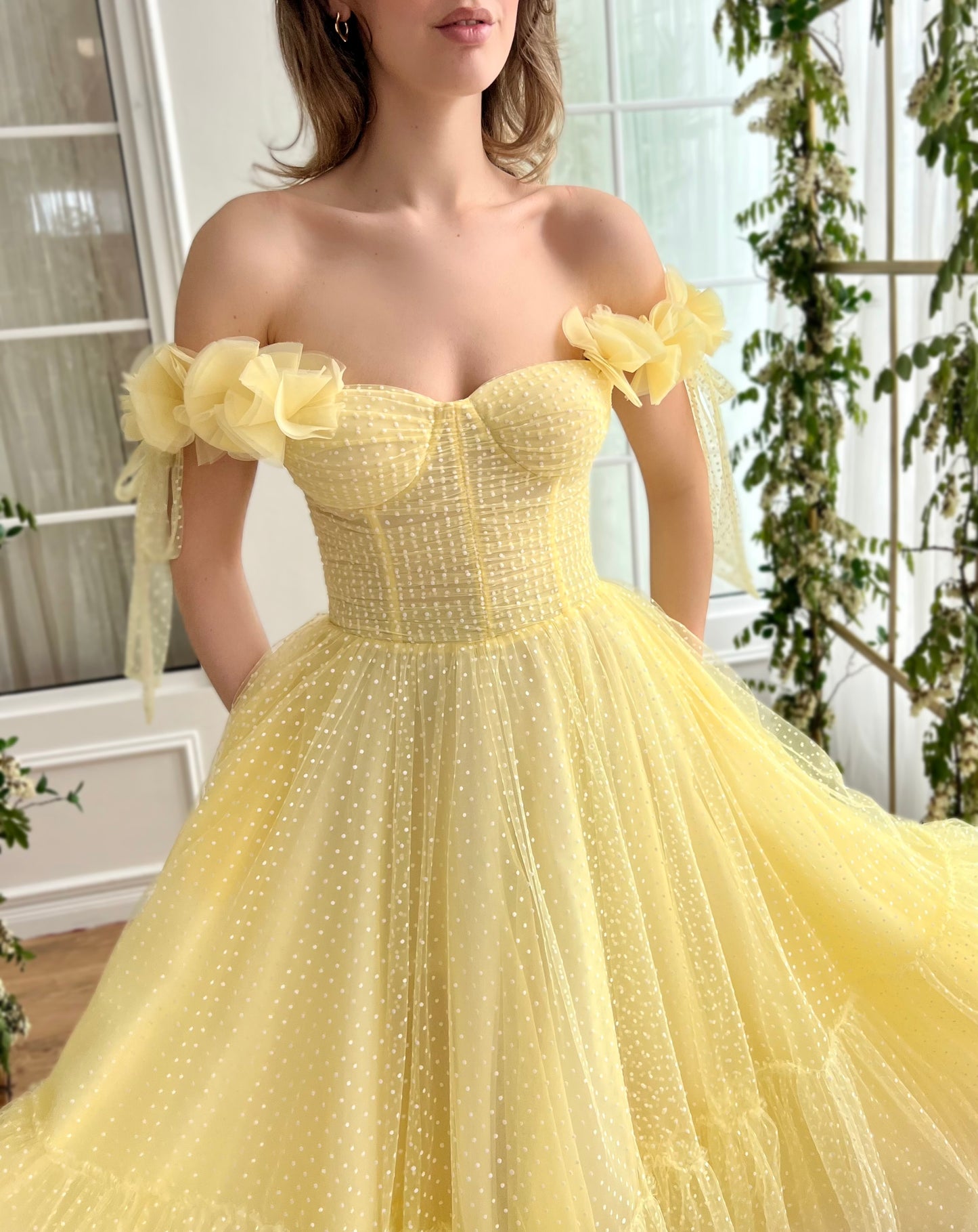 Yellow midi dress with off the shoulder sleeves and embroidery