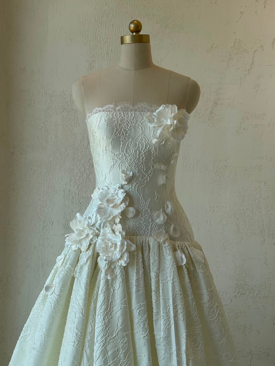 White A-Line gown with embroidery and no sleeves