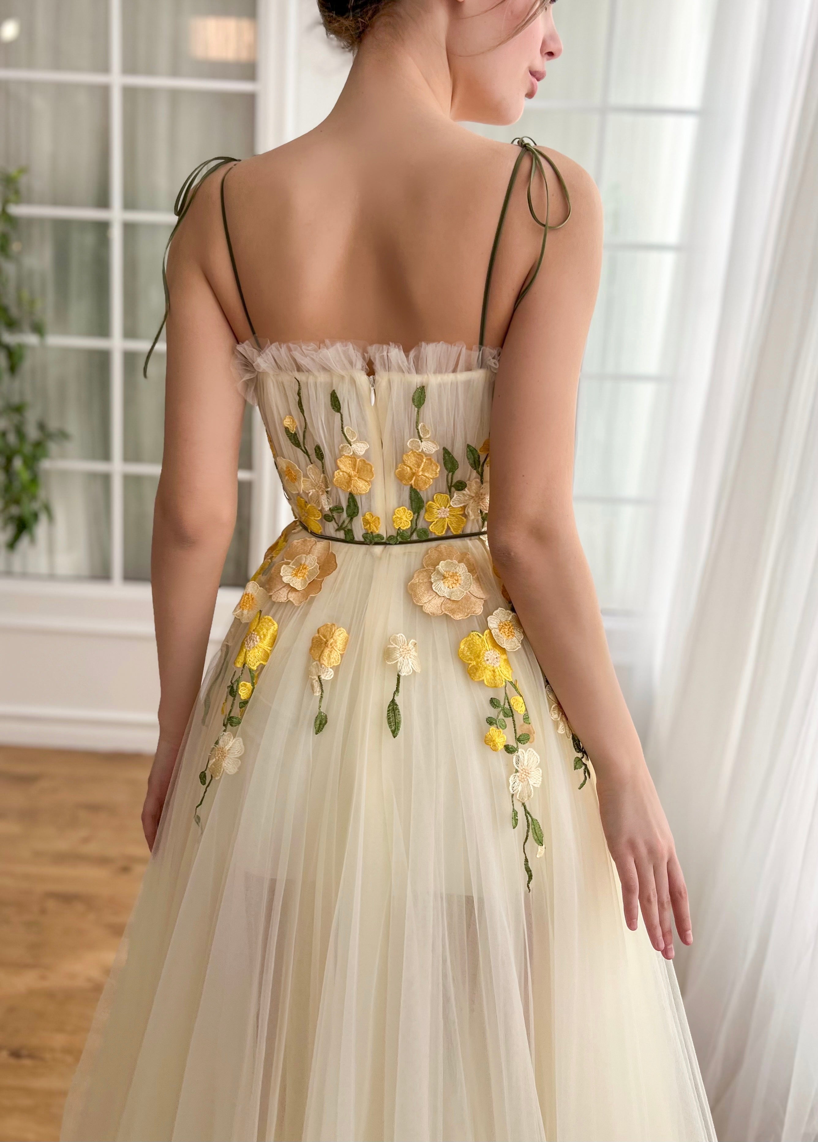 Yellow A-Line dress with spaghetti straps and embroidered flowers