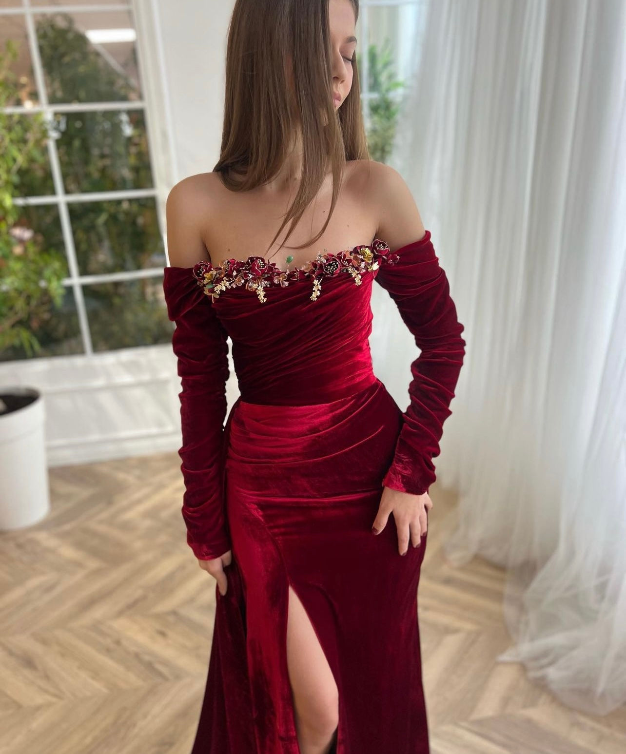 Red mermaid dress with long off the shoulder sleeves and embroidery