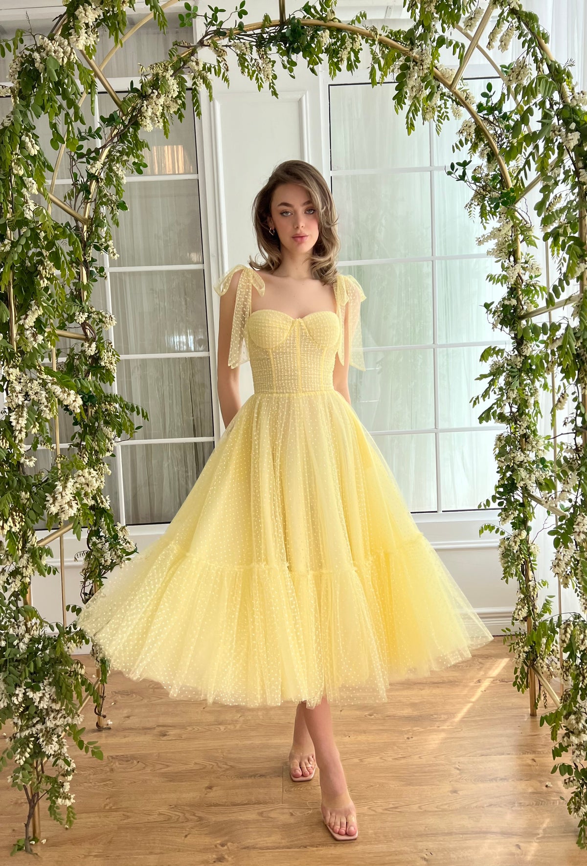 Yellow midi dress with off the shoulder sleeves and embroidery