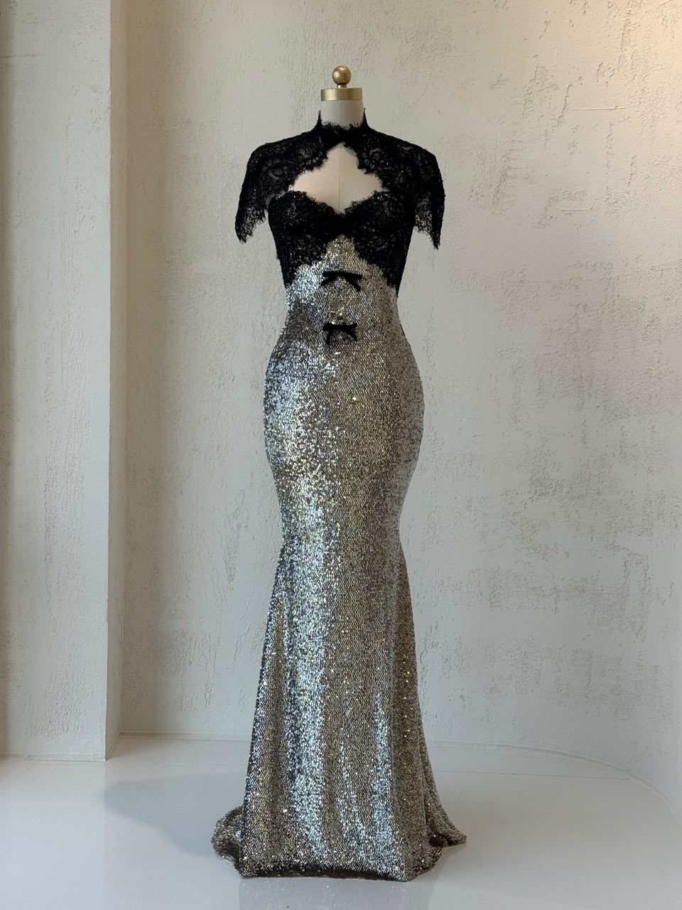 Black and grey mermaid gown with lace, sequins, embroidered bows and bolero