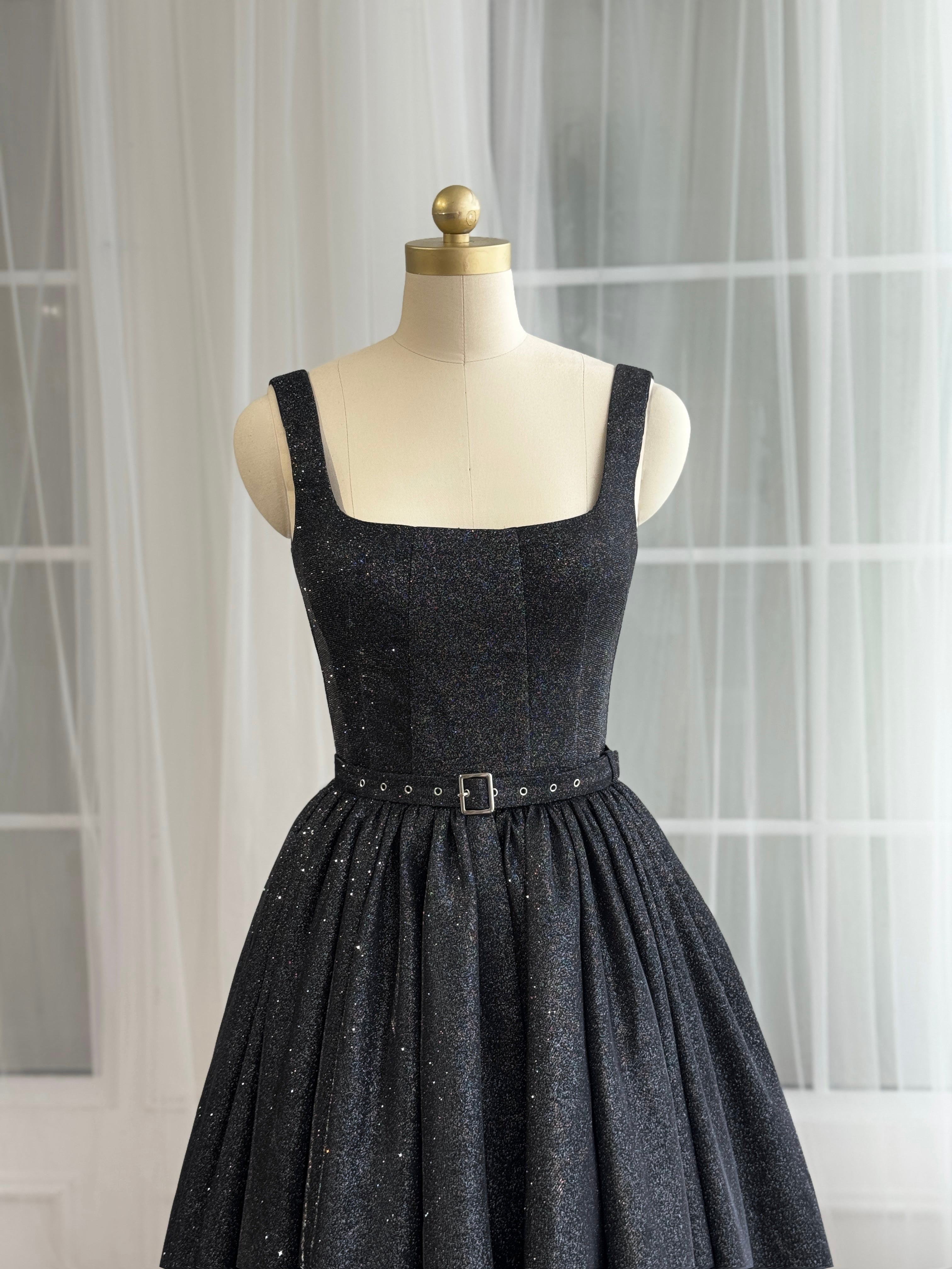 Black midi dress with straps, belt and sparkly fabric
