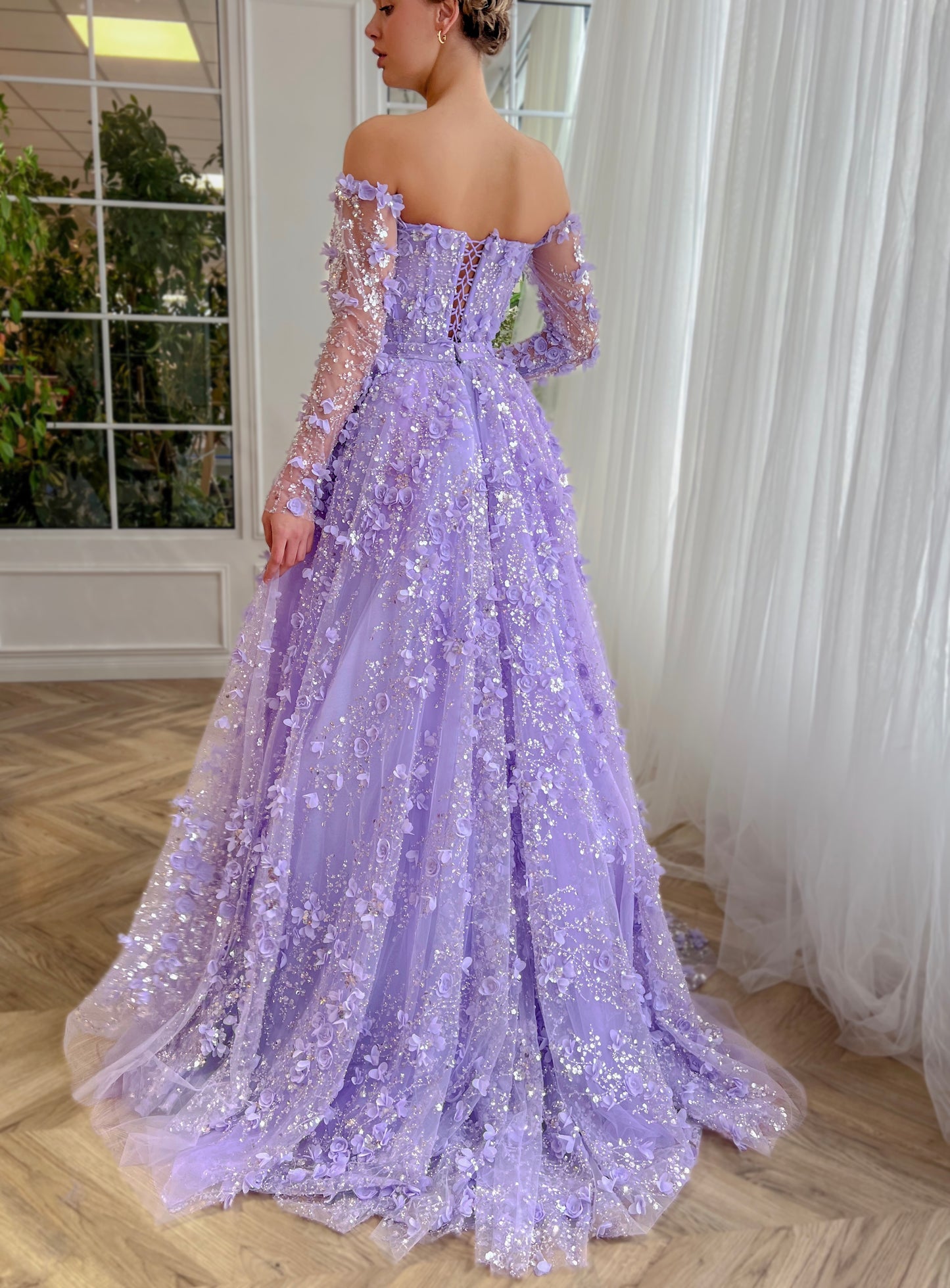 Purple overskirt dress with long off the shoulder sleeves and embroidered flowers