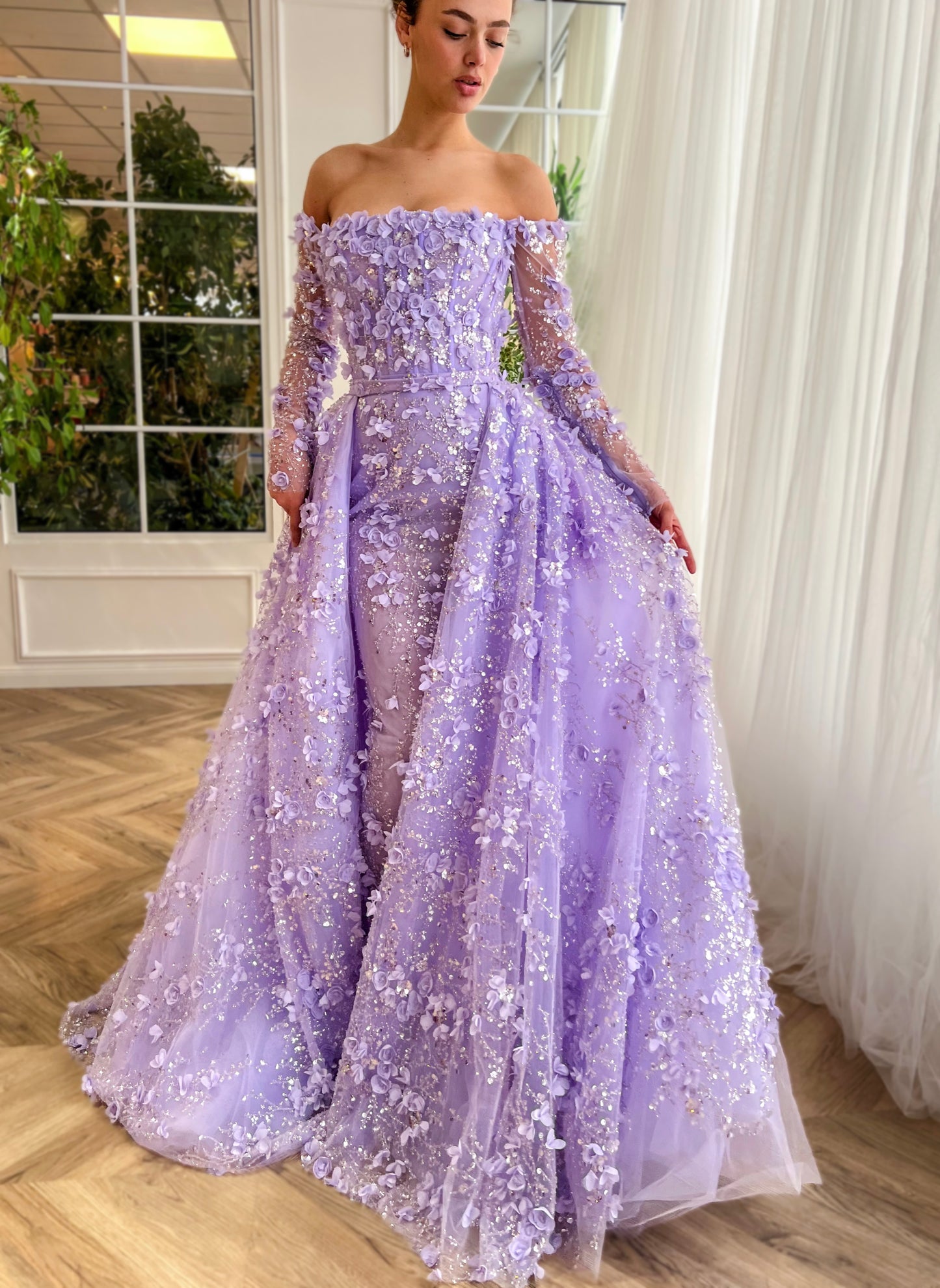 Purple overskirt dress with long off the shoulder sleeves and embroidered flowers