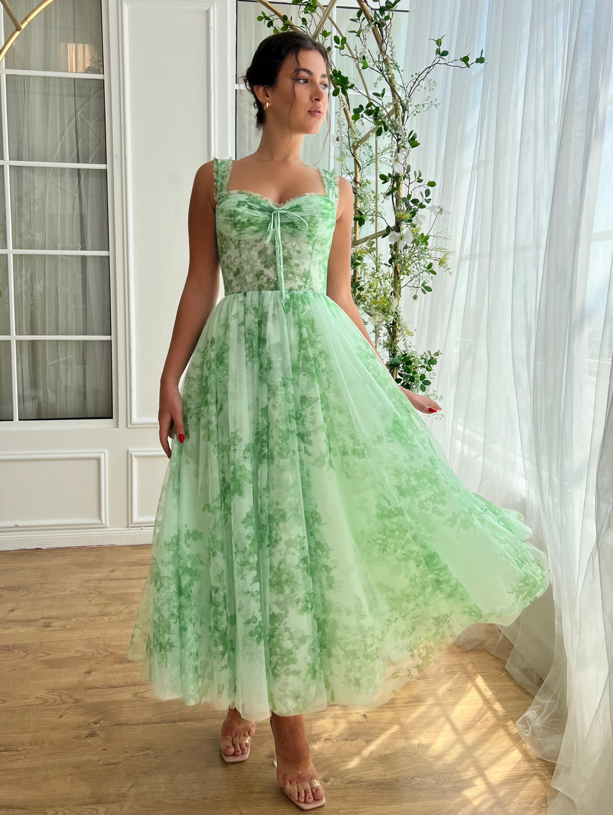 Green midi dress with printed fabric and straps