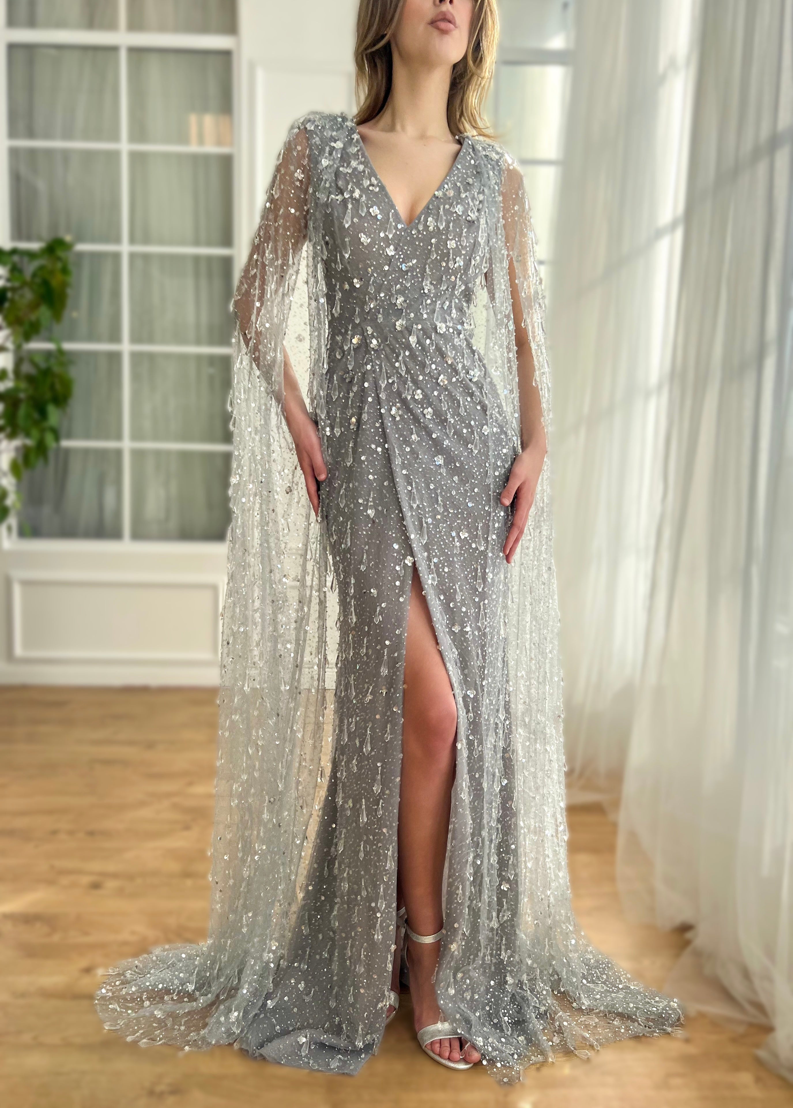 Grey mermaid dress with v-neck, cape and embroidered crystals