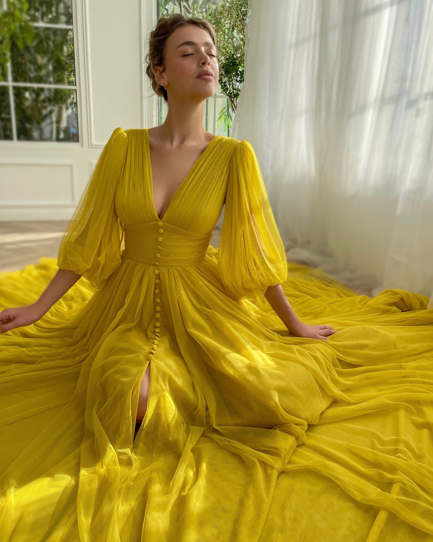 Yellow A-Line dress with long sleeves and v-neck