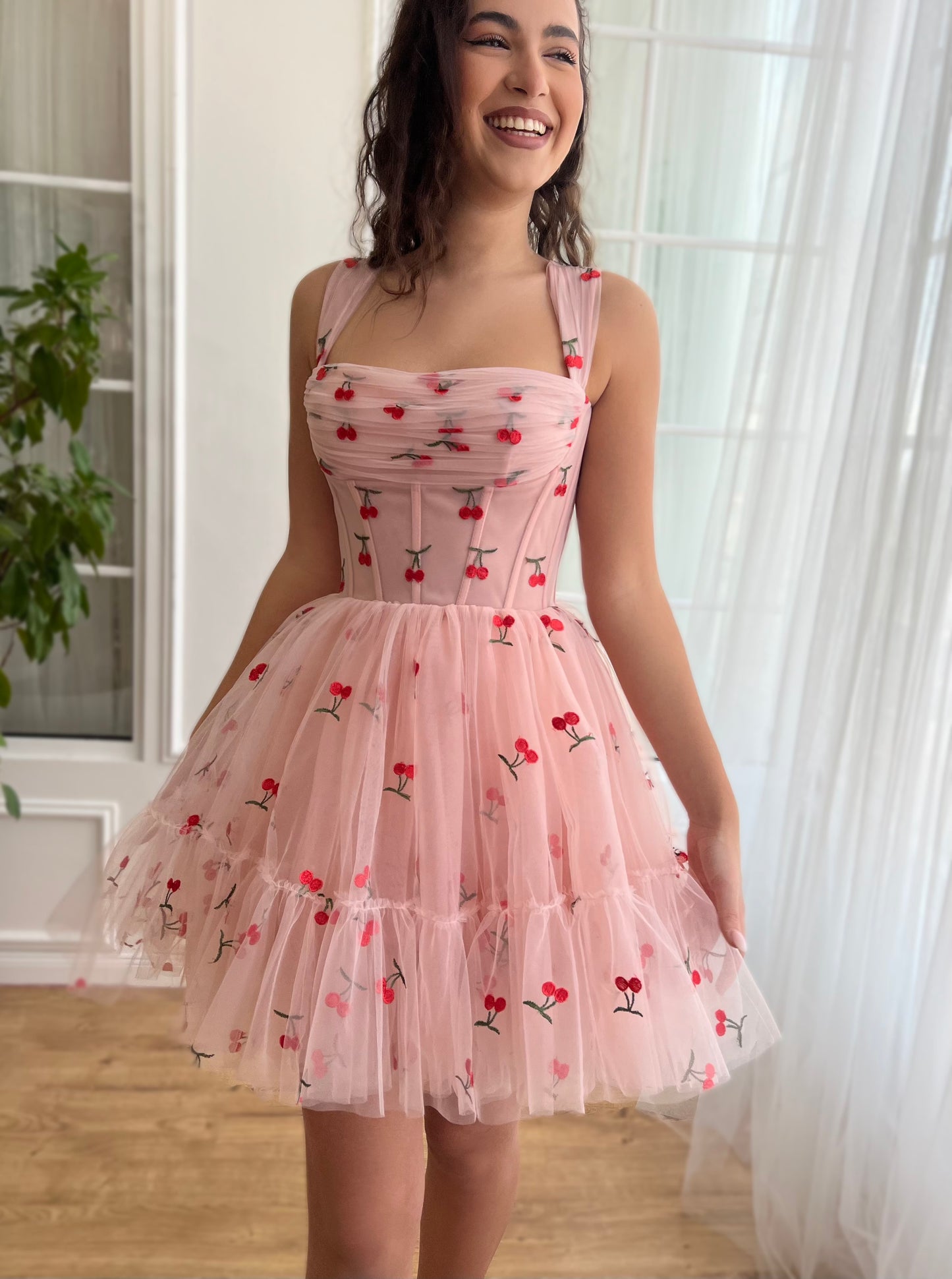 Pink mini dress with cherries and straps