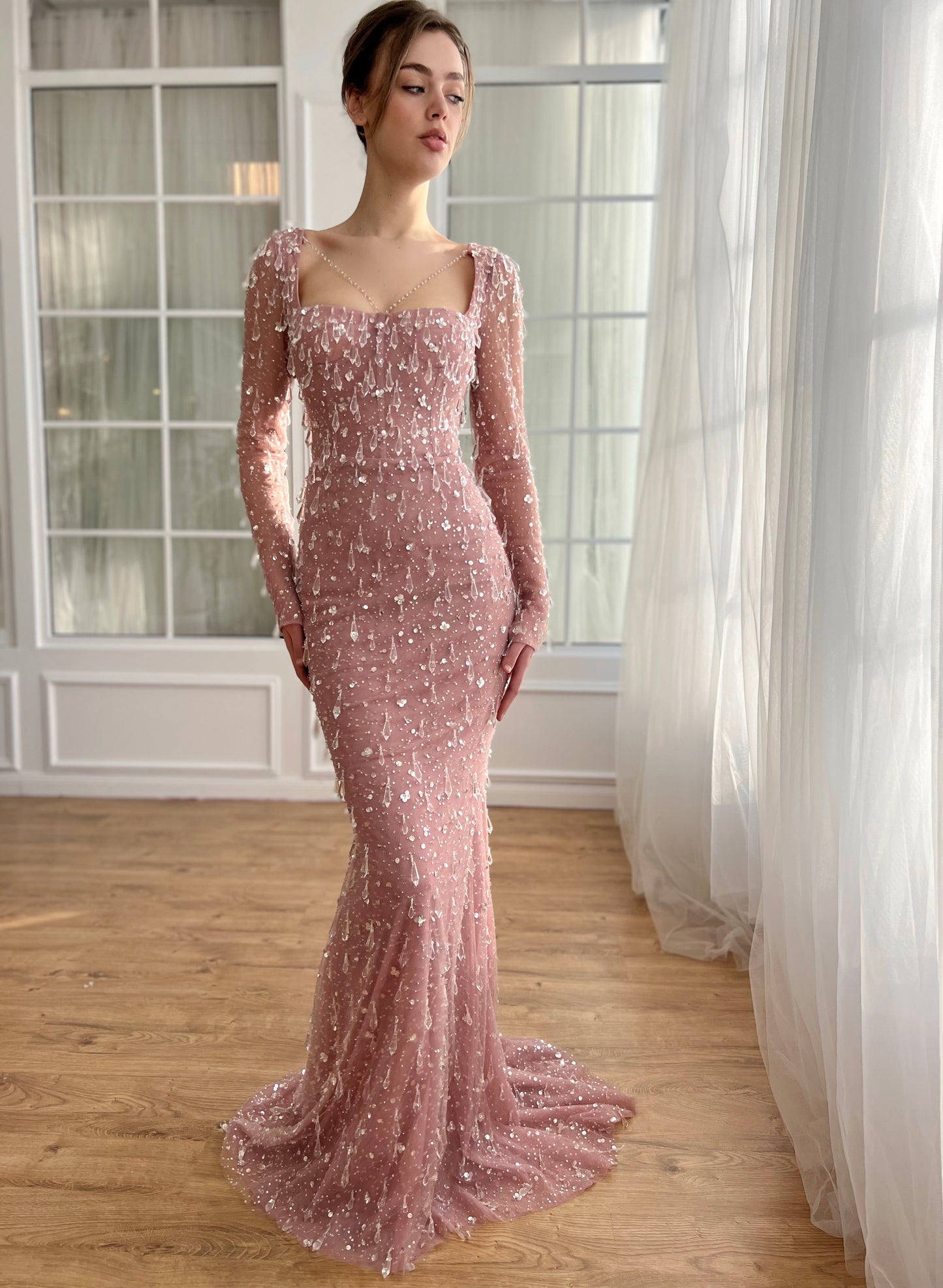 Pink mermaid dress with embroidered crystals and long sleeves
