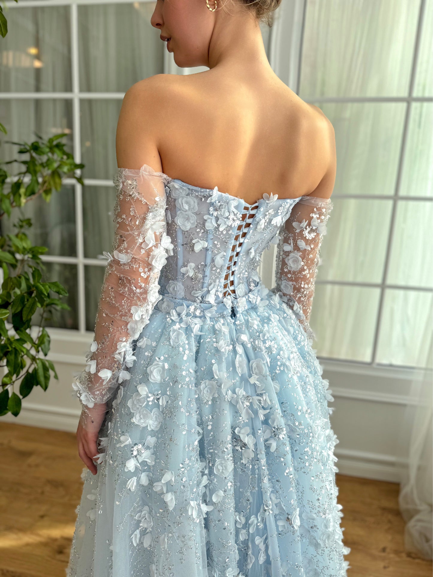 Light blue A-Line dress with long off the shoulder sleeves, overskirt and embroidery