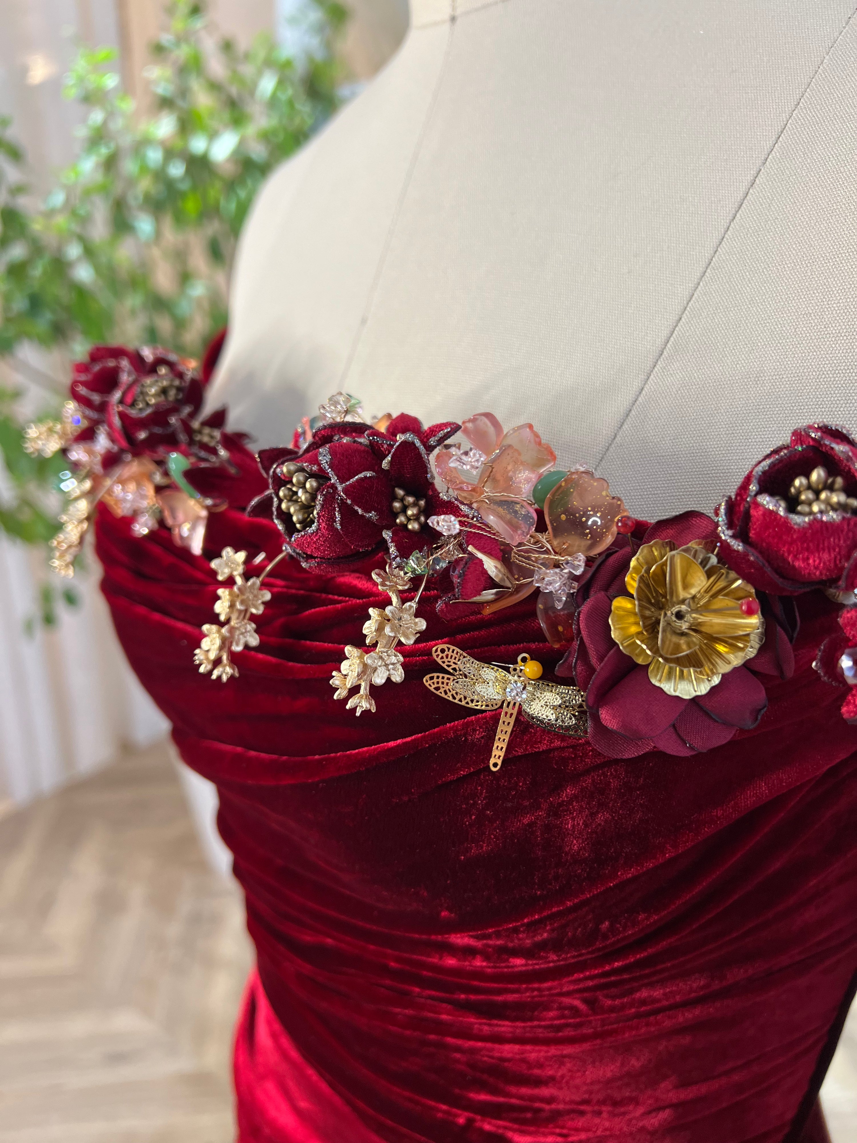 Red mermaid dress with long off the shoulder sleeves and embroidery
