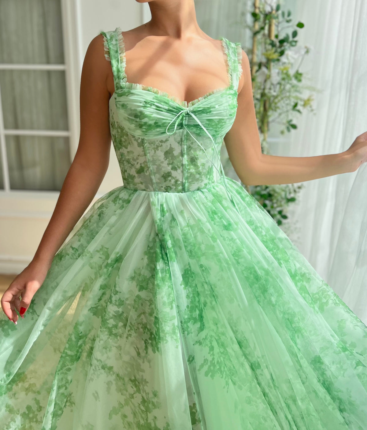 Green A-Line dress with straps and printed fabric