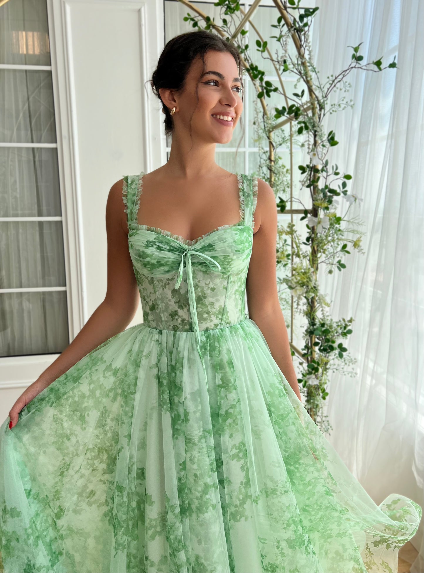 Green midi dress with printed fabric and straps