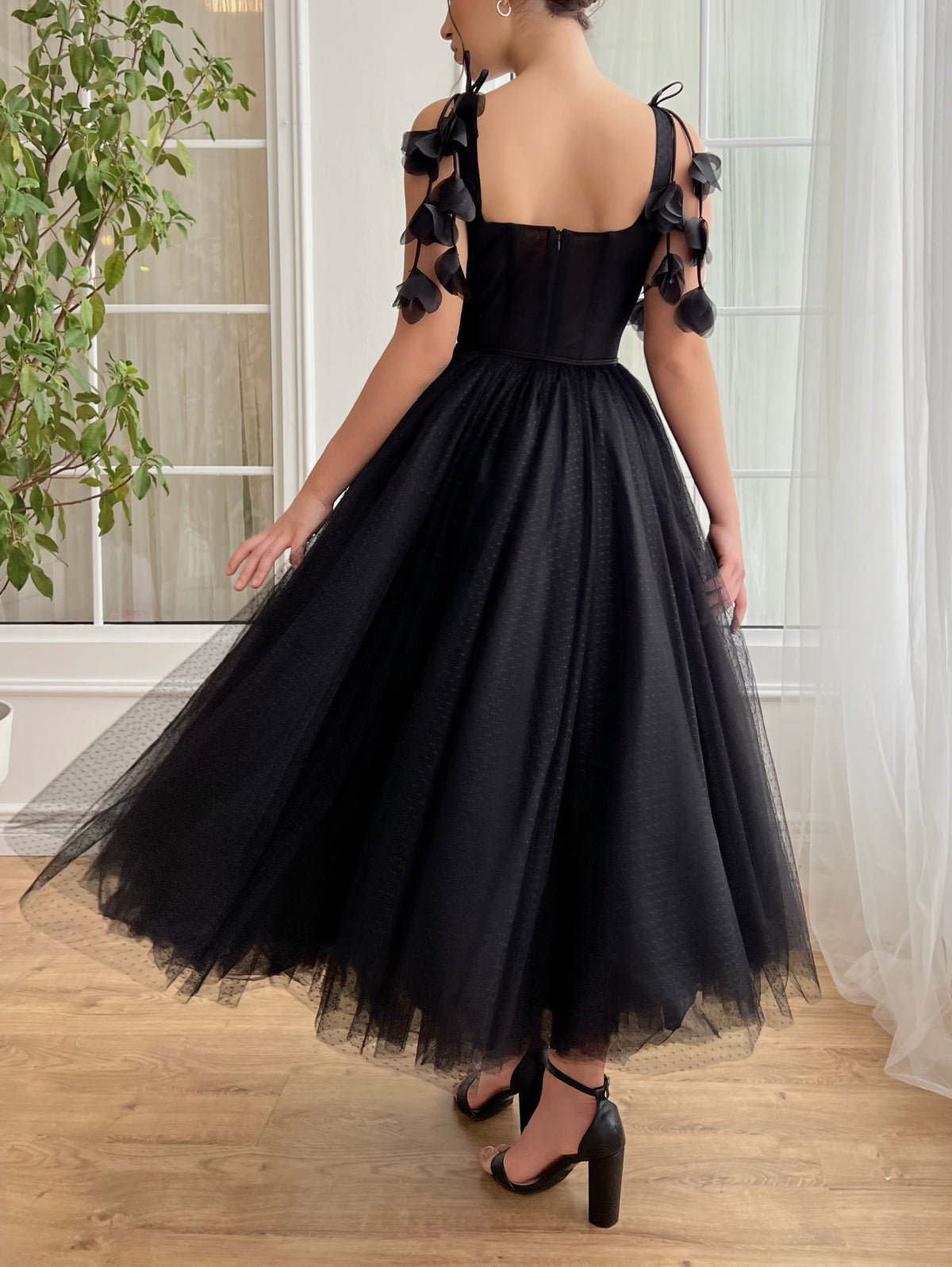 Black midi dress with embroidered flowers and straps