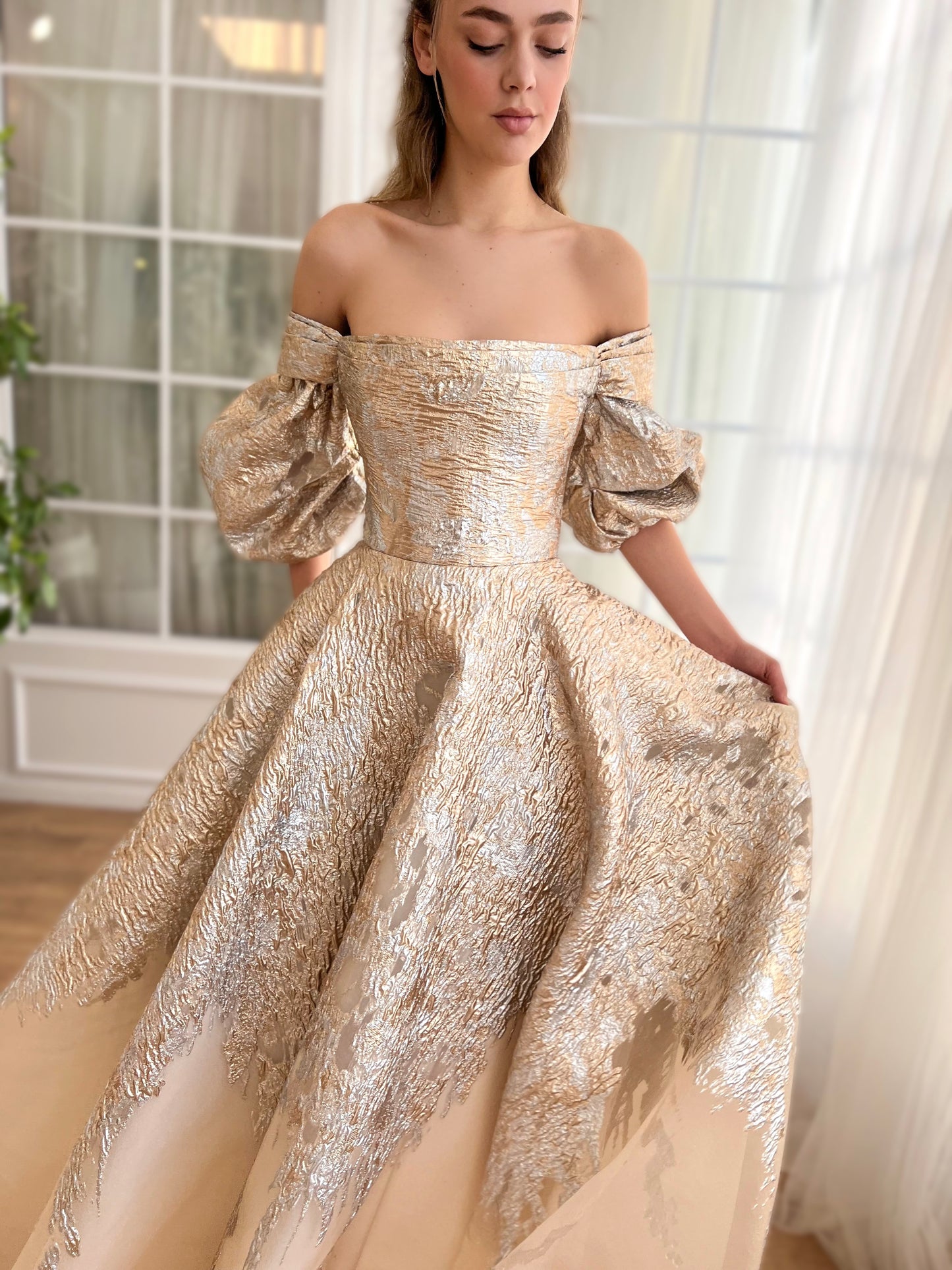 Beige A-Line dress with long off the shoulder sleeves