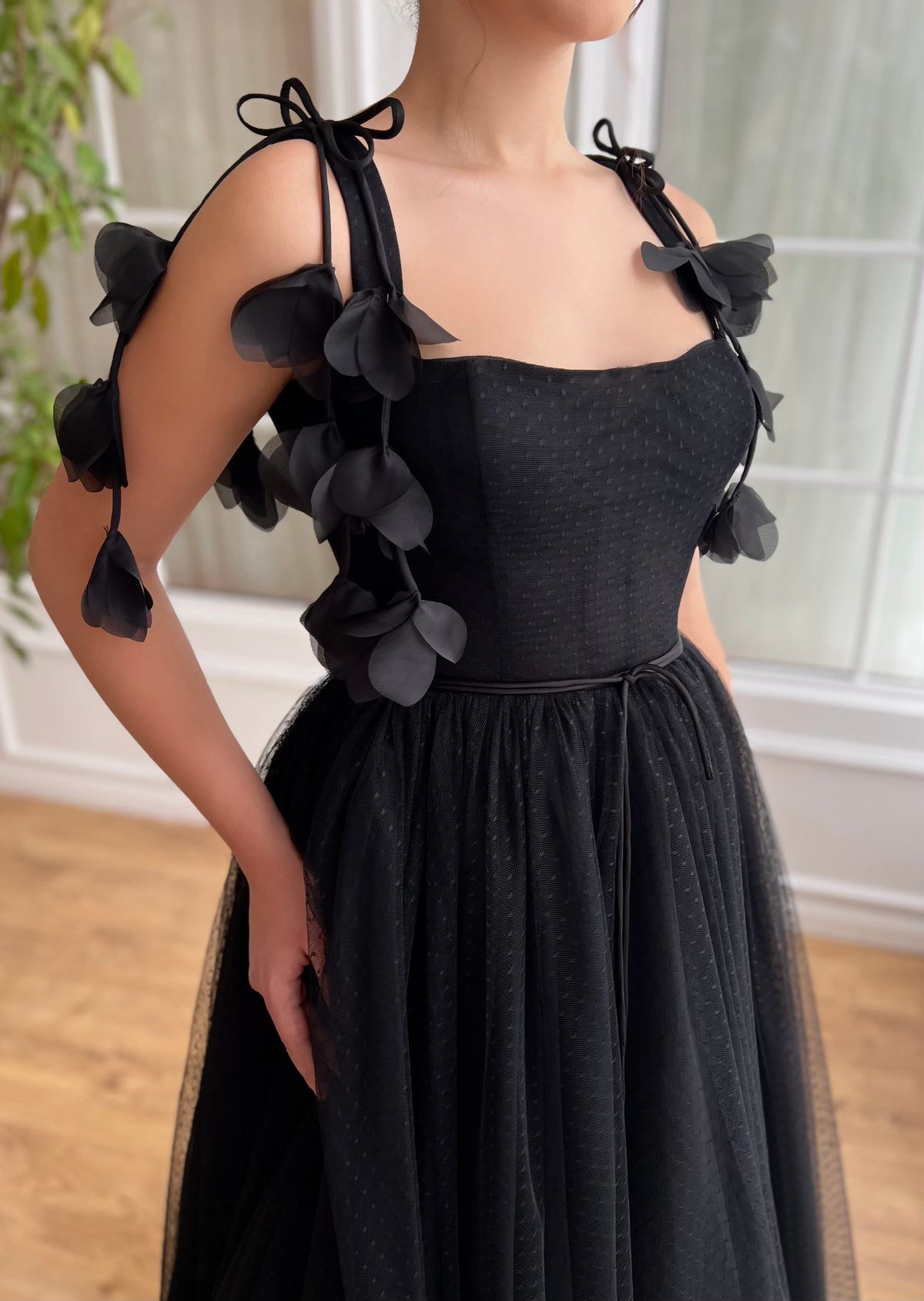 Black midi dress with embroidered flowers and straps