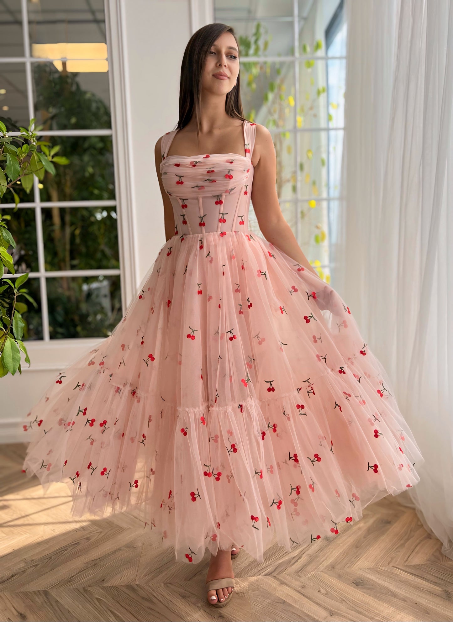 Pink midi dress with printed cherries and straps