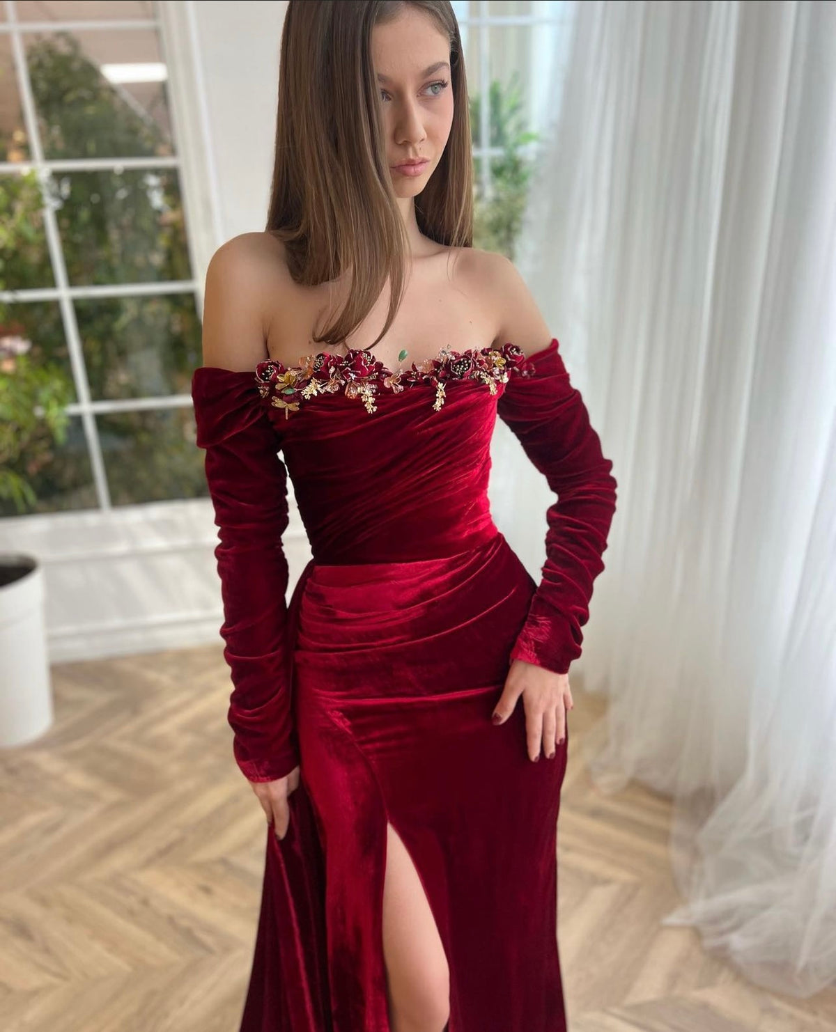 Red mermaid dress with long off the shoulder sleeves and embroidery