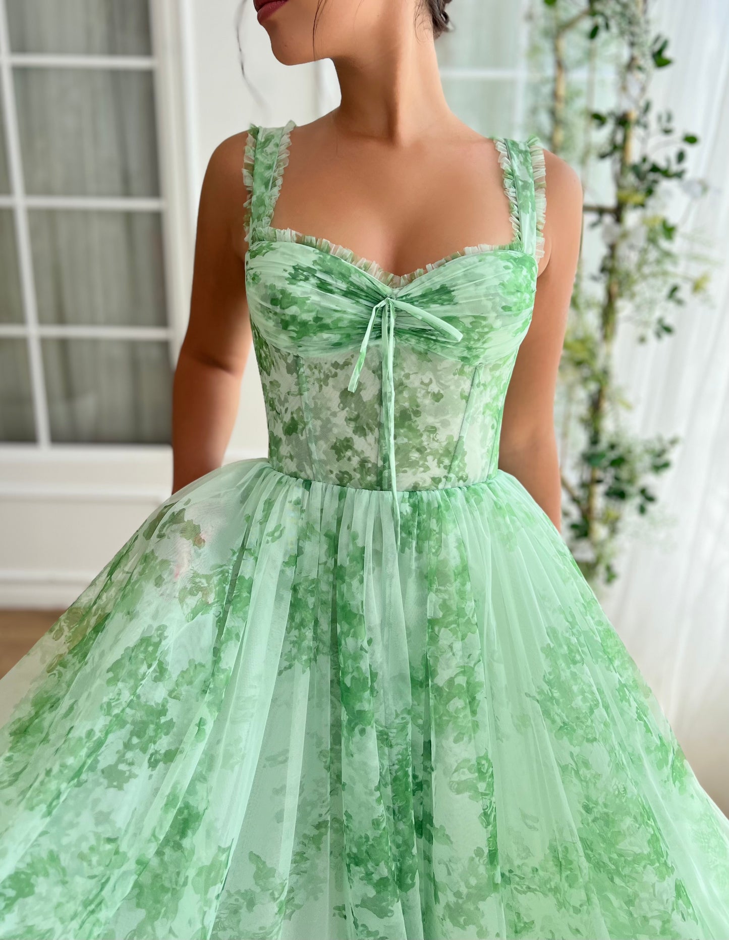 Green midi dress with printed fabric and straps