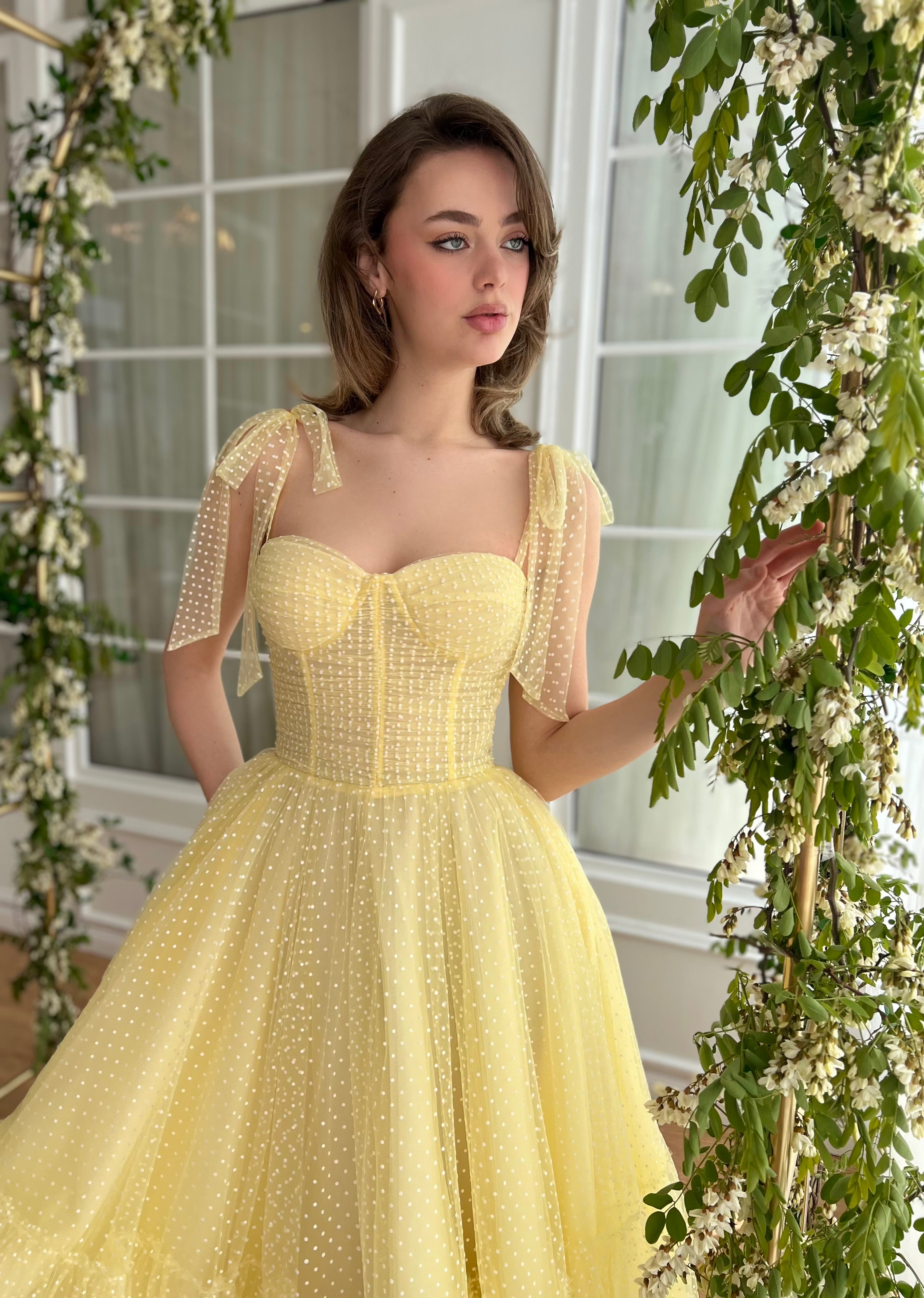Yellow midi dress with off the shoulder sleeves and embroidery