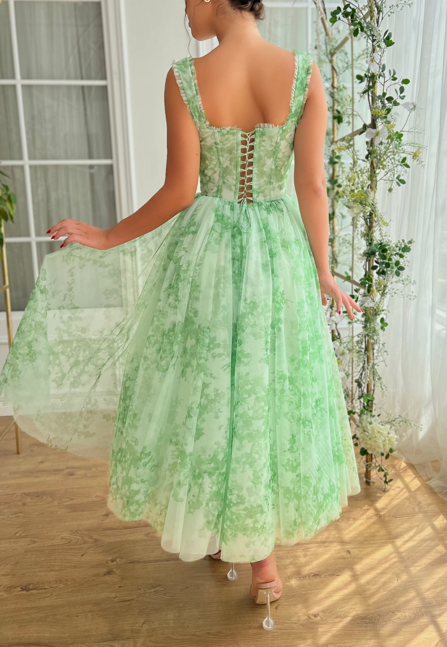 Green midi dress with printed fabric and straps