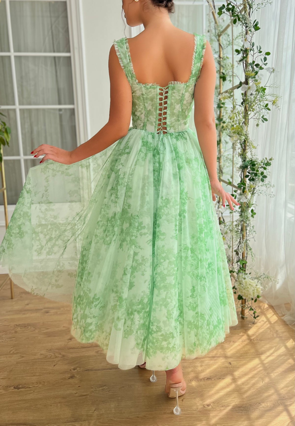 Green midi dress with printed fabric and straps